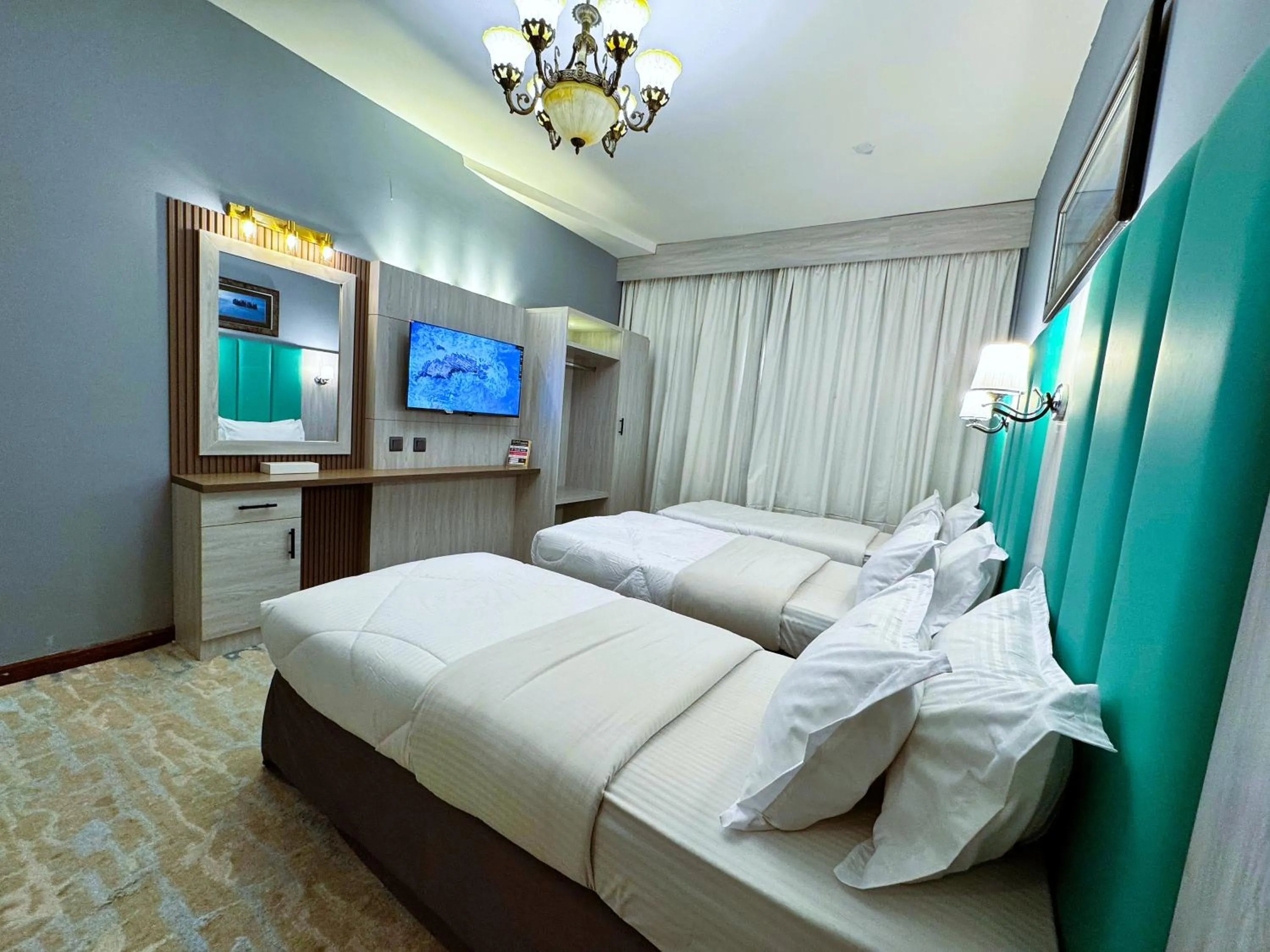 TV and multimedia, Bed in Hafez Hotel Apartments - Al Ras Metro Station