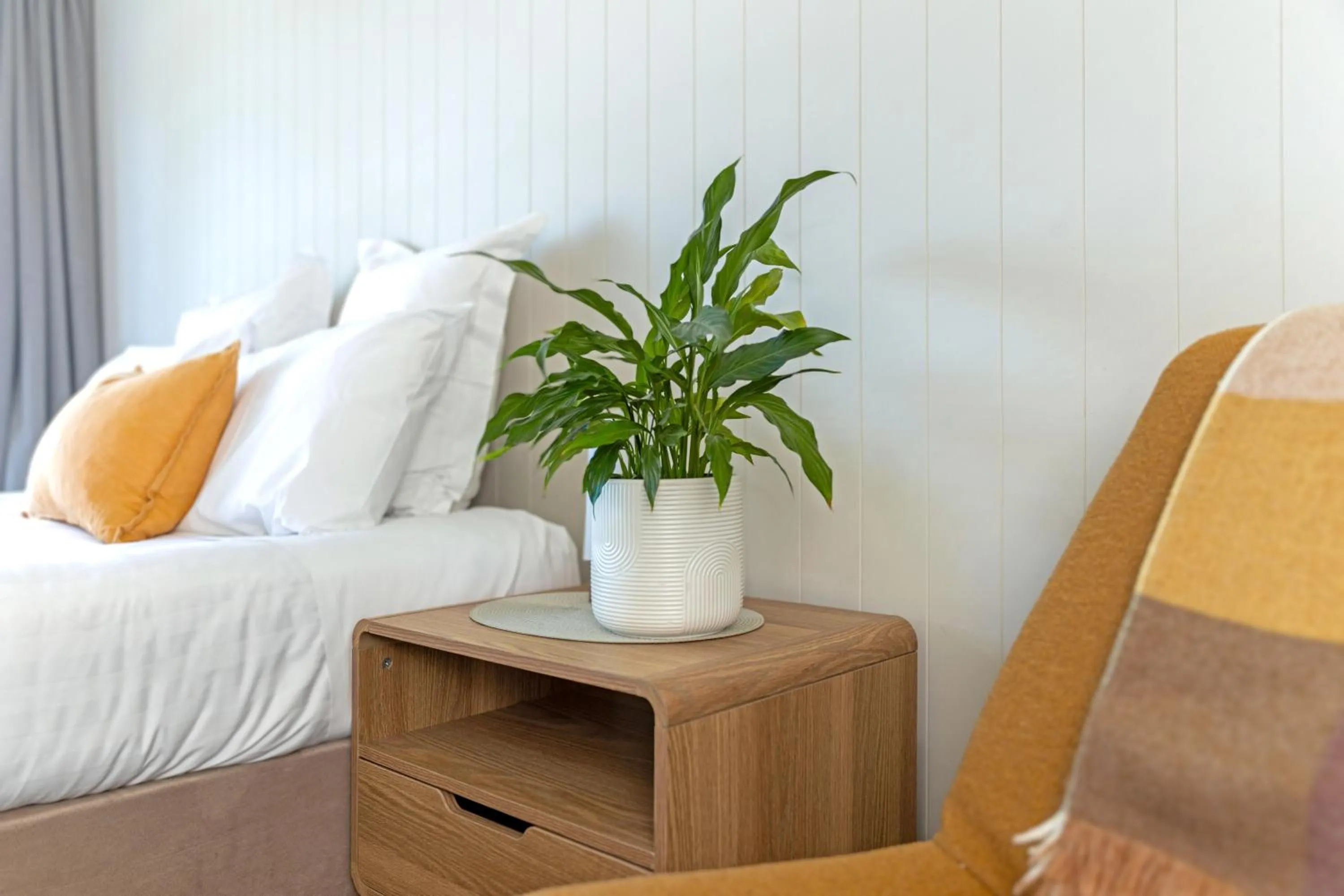 Bed in Whispering Sands Beachfront Motel