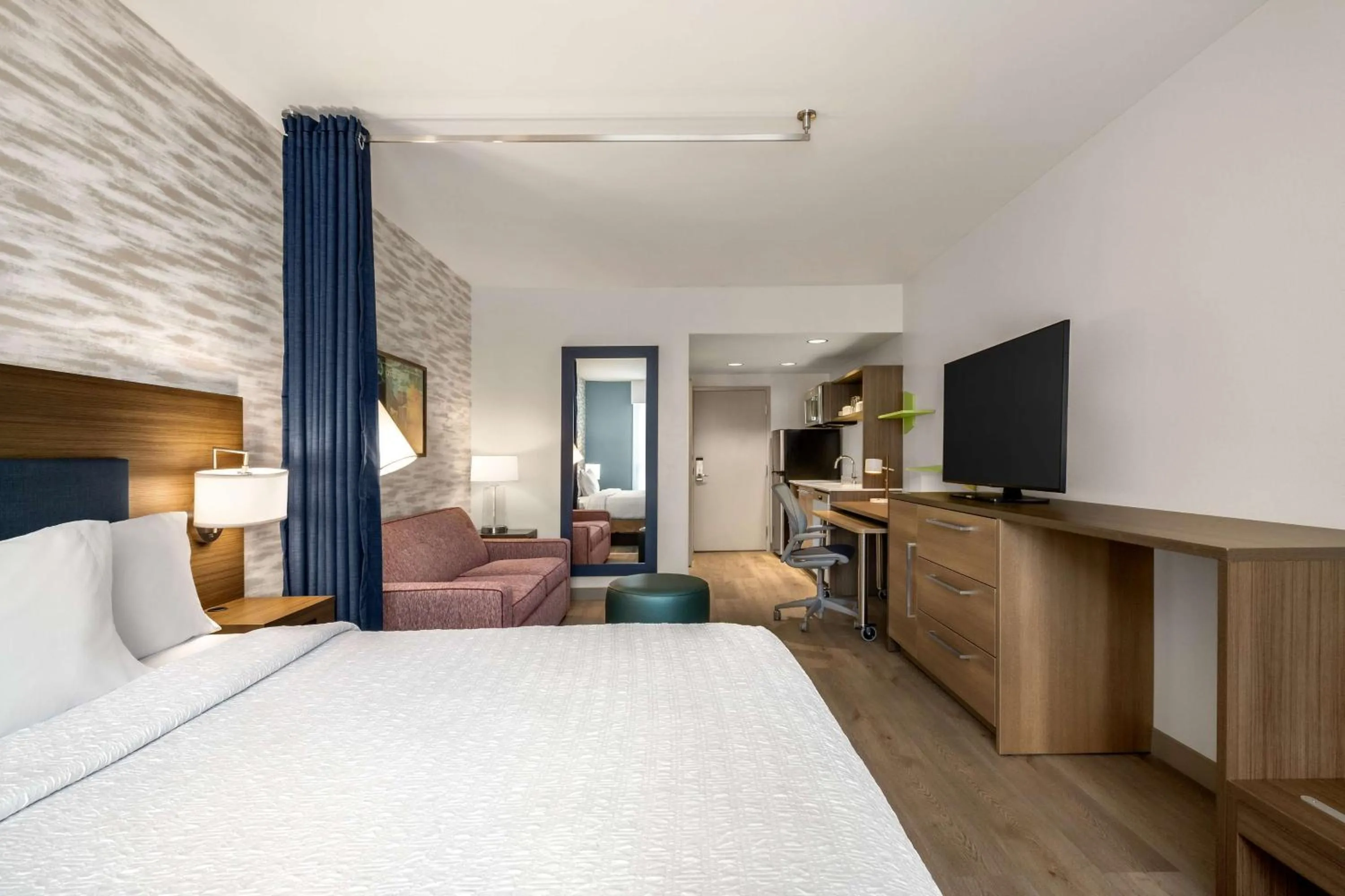 Living room, Bed in Home2 Suites By Hilton East Austin - near Downtown and UT