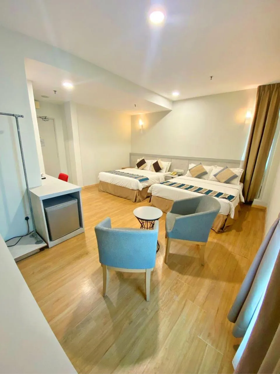 Bed in The Explorer Hotel