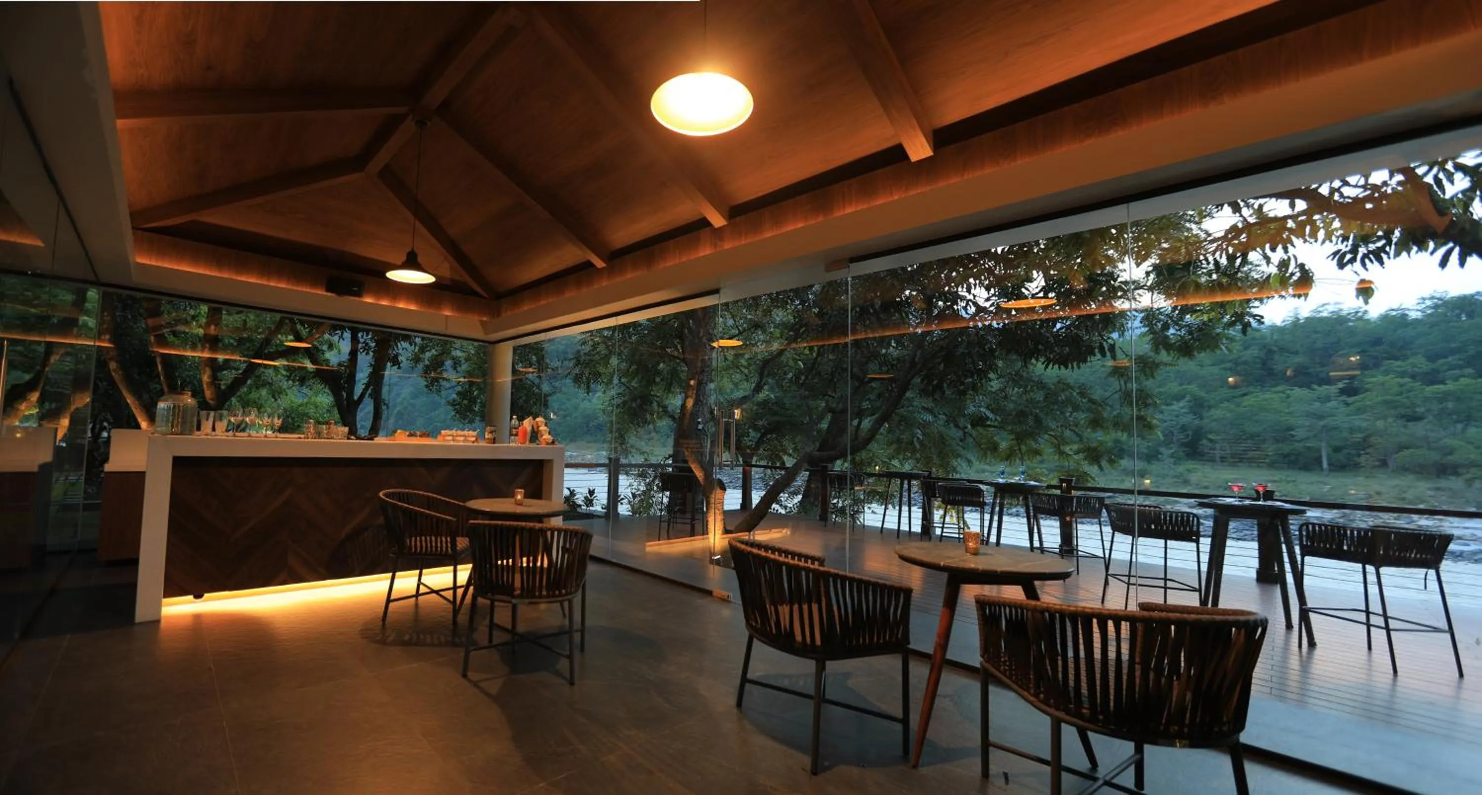 Seating area in Anand Kashi by the Ganges Rishikesh - IHCL Seleqtions