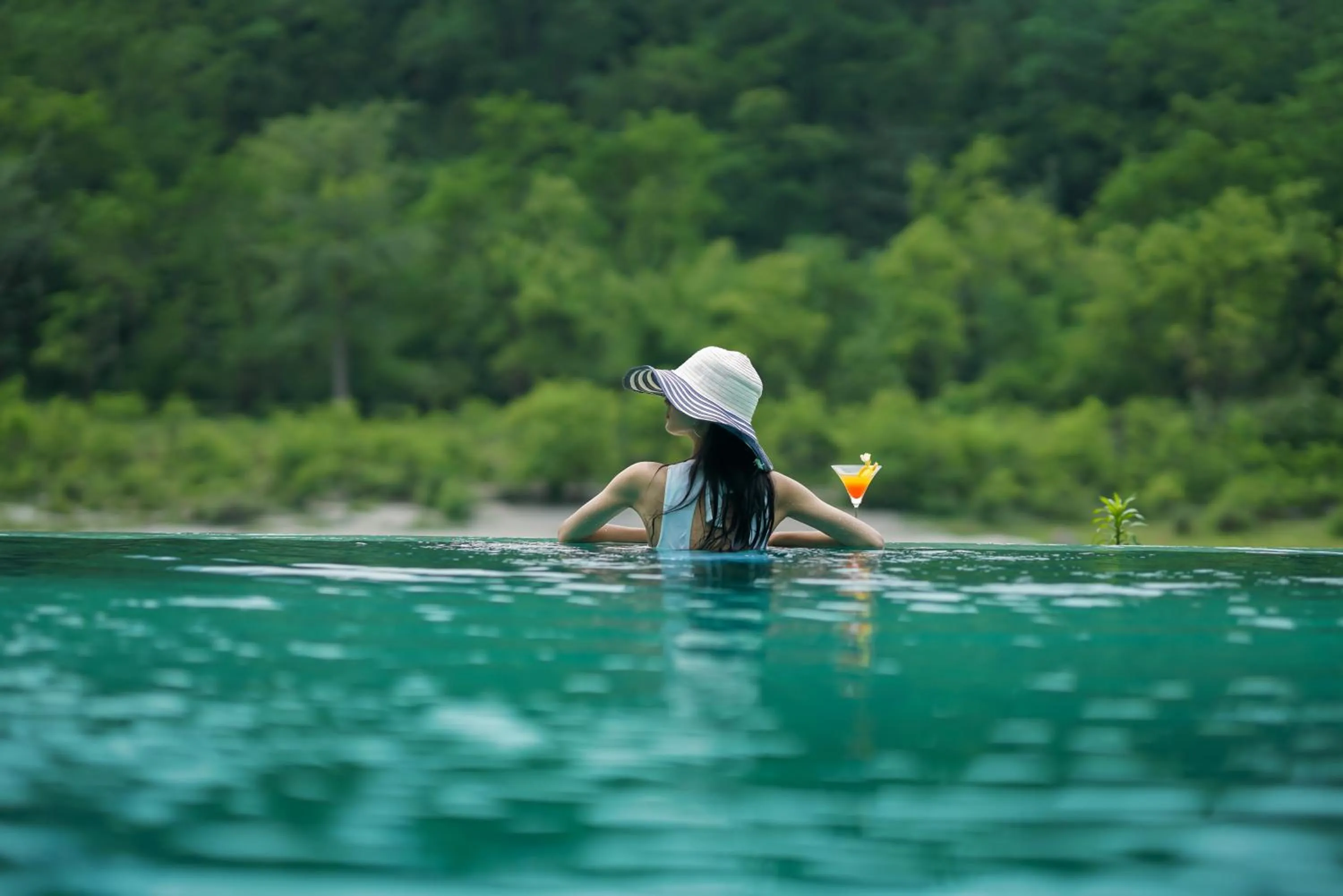 Swimming pool in Anand Kashi by the Ganges Rishikesh - IHCL Seleqtions