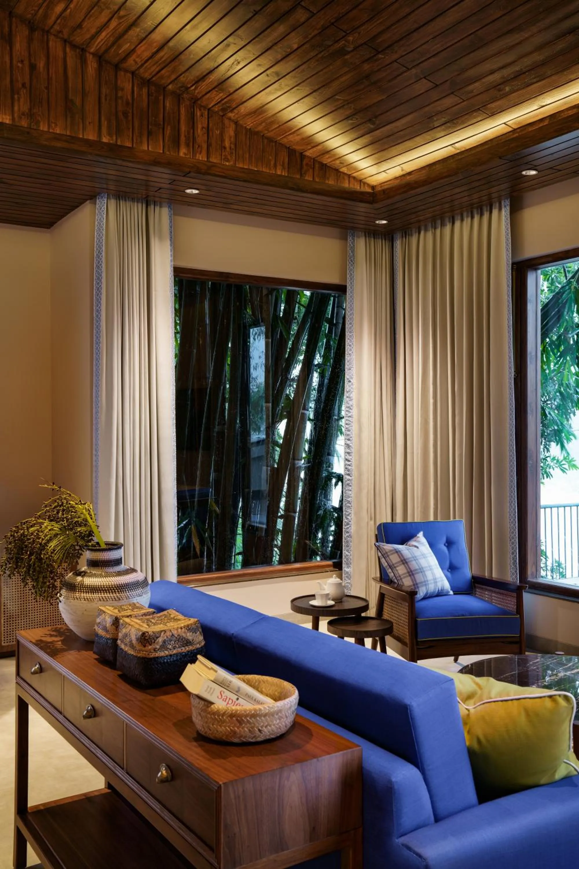 Seating area in Anand Kashi by the Ganges Rishikesh - IHCL Seleqtions