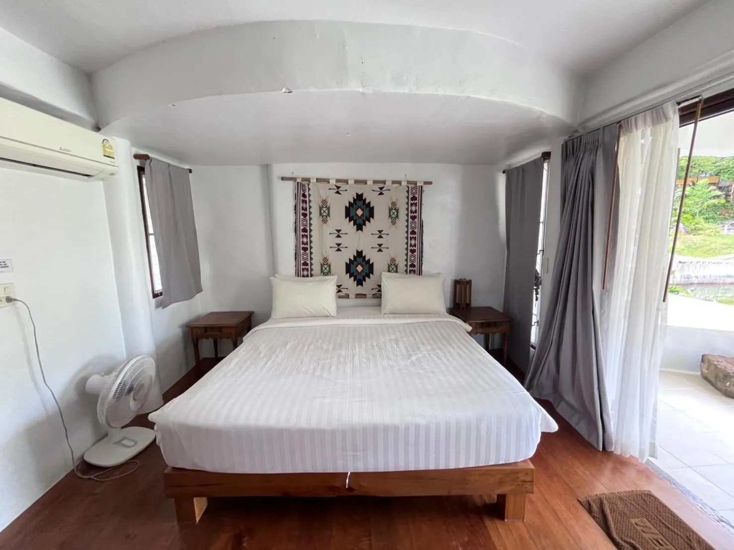 Bed in Koh Mak Cococape Resort