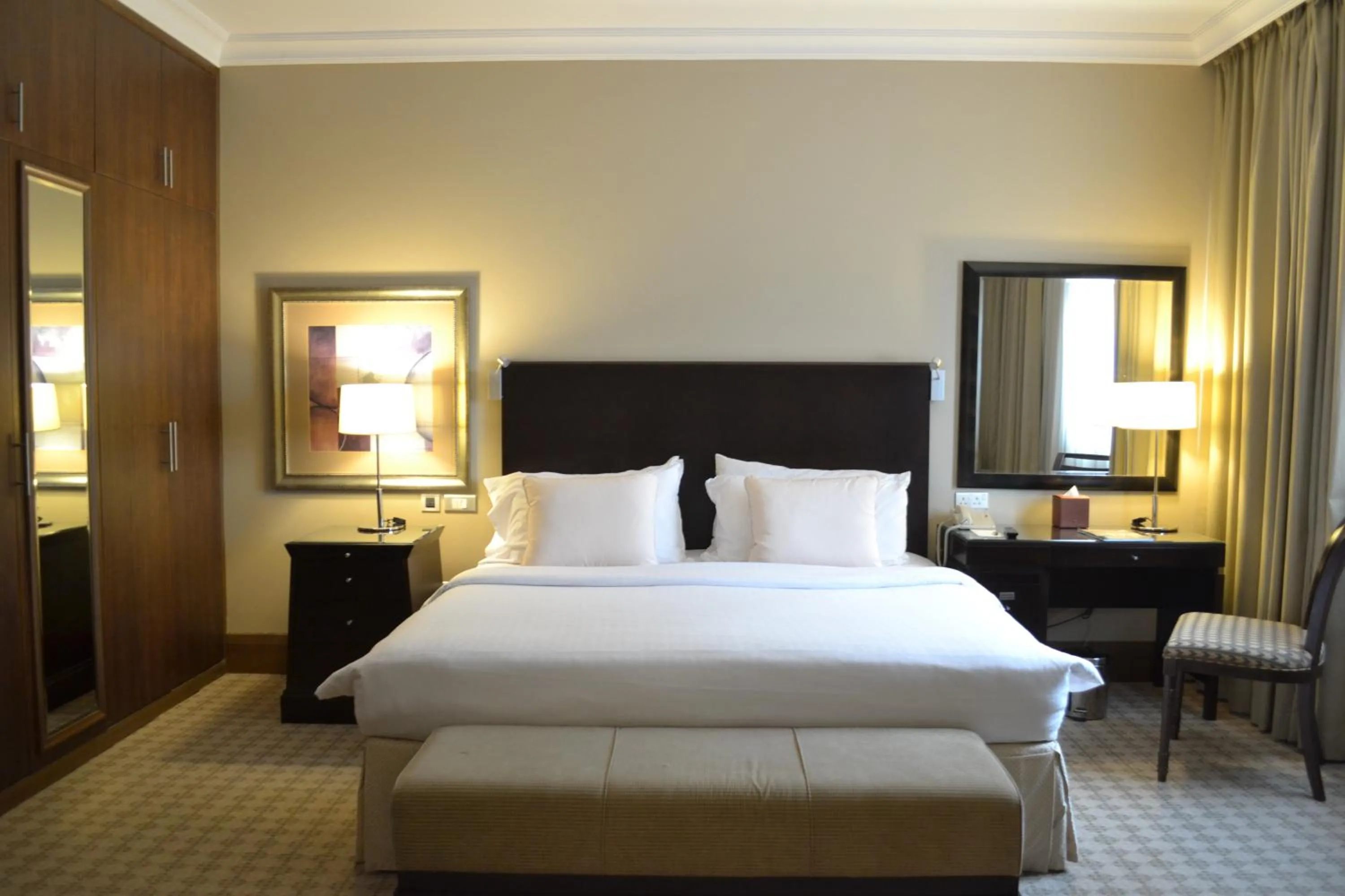 Bed in Sheraton Khalidiya Hotel