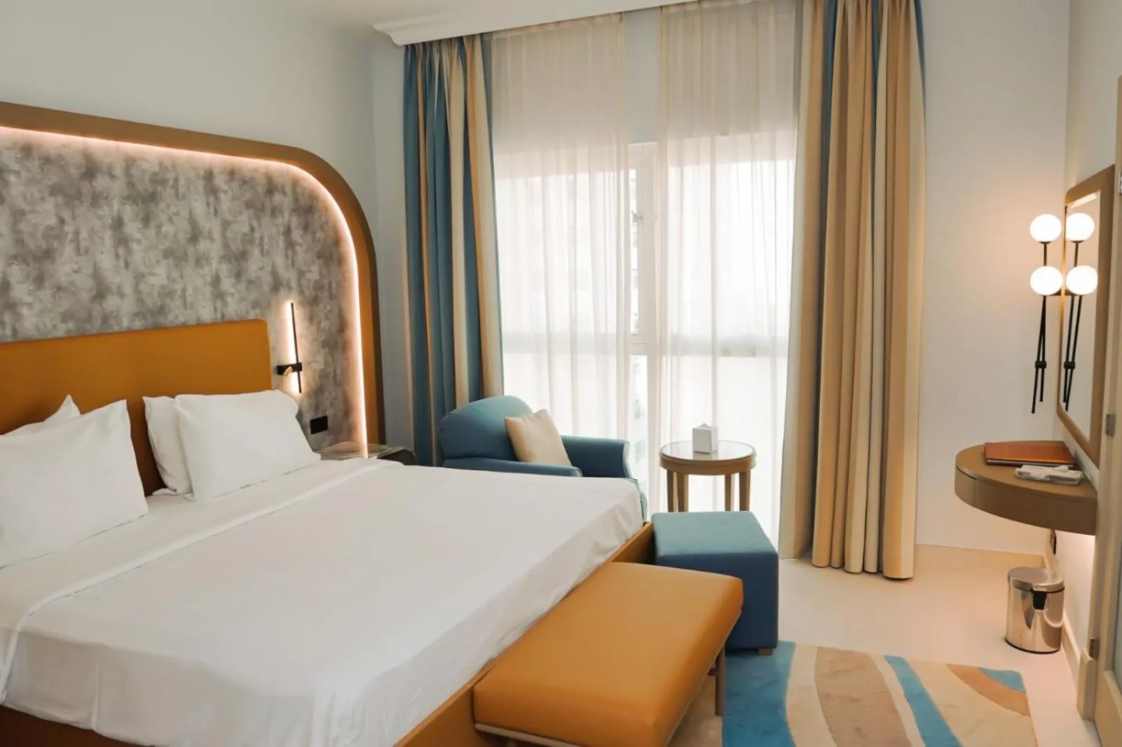 Bed in Sheraton Khalidiya Hotel