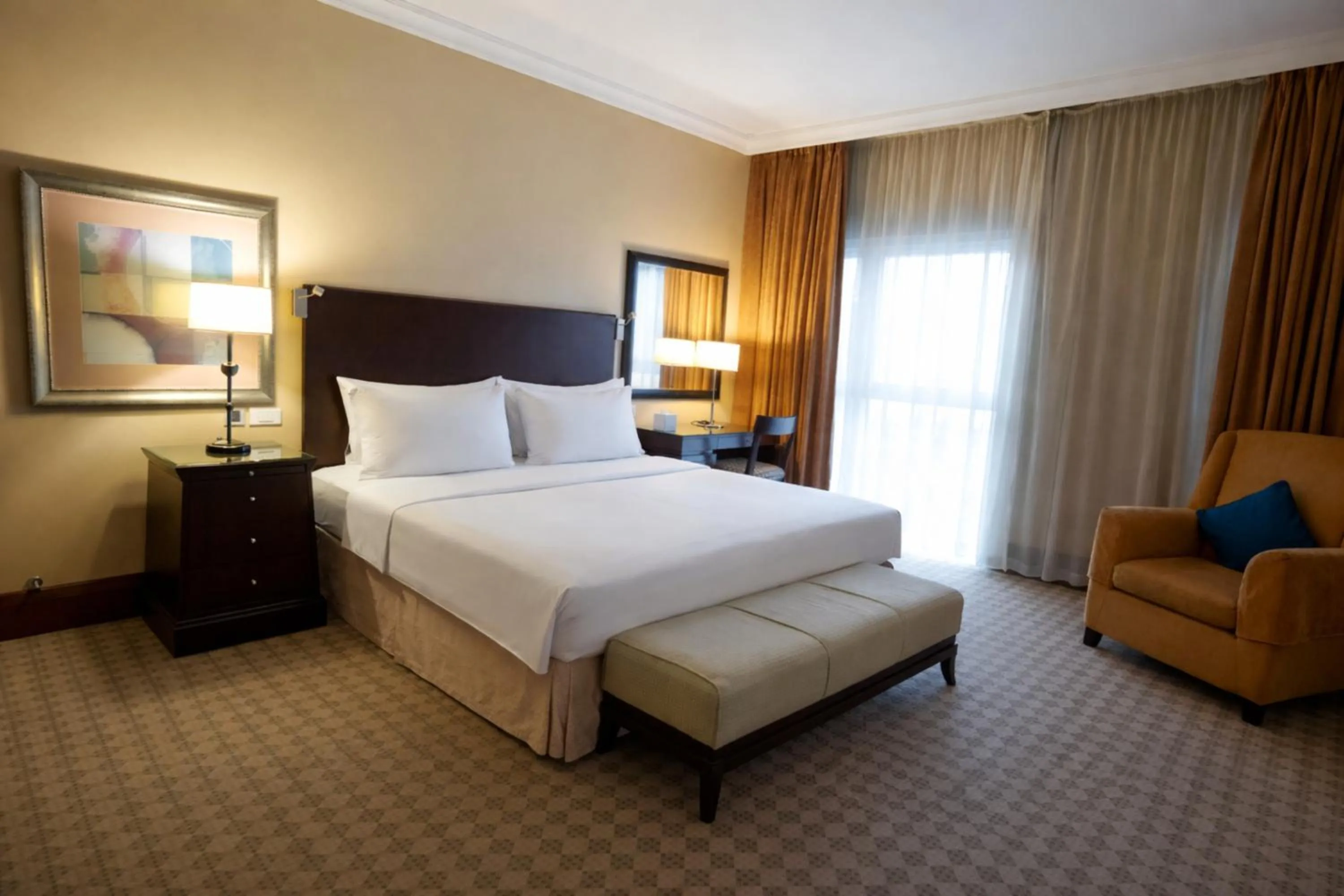 Bed in Sheraton Khalidiya Hotel