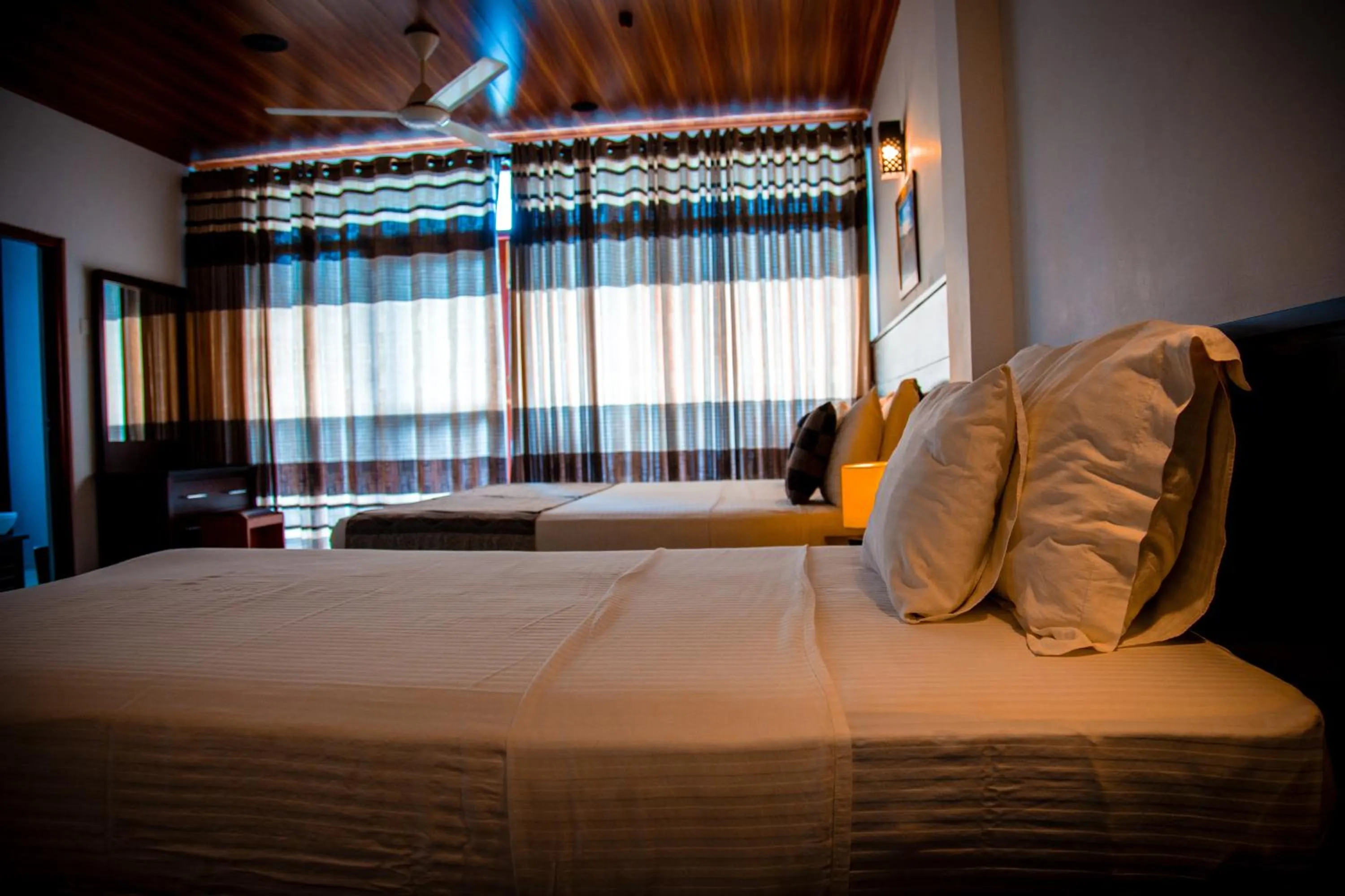 Bed in Riverside Inn Fuji