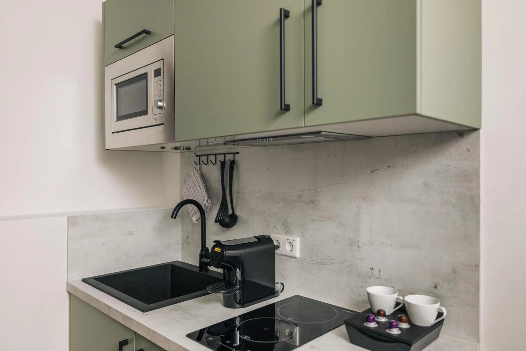 Kitchen or kitchenette in Homaris Apartments Frankfurt