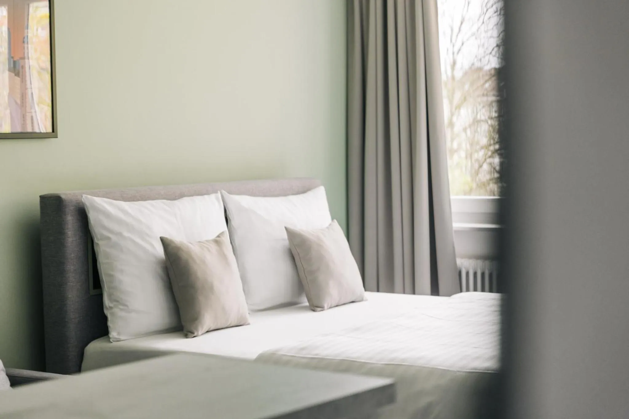 Bed in Homaris Apartments Frankfurt