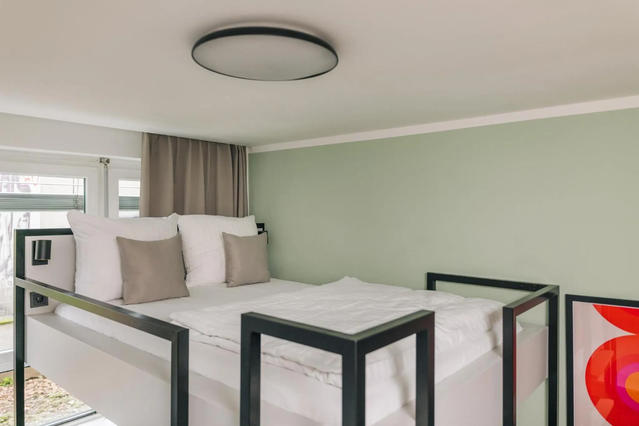 Bed in Homaris Apartments Frankfurt