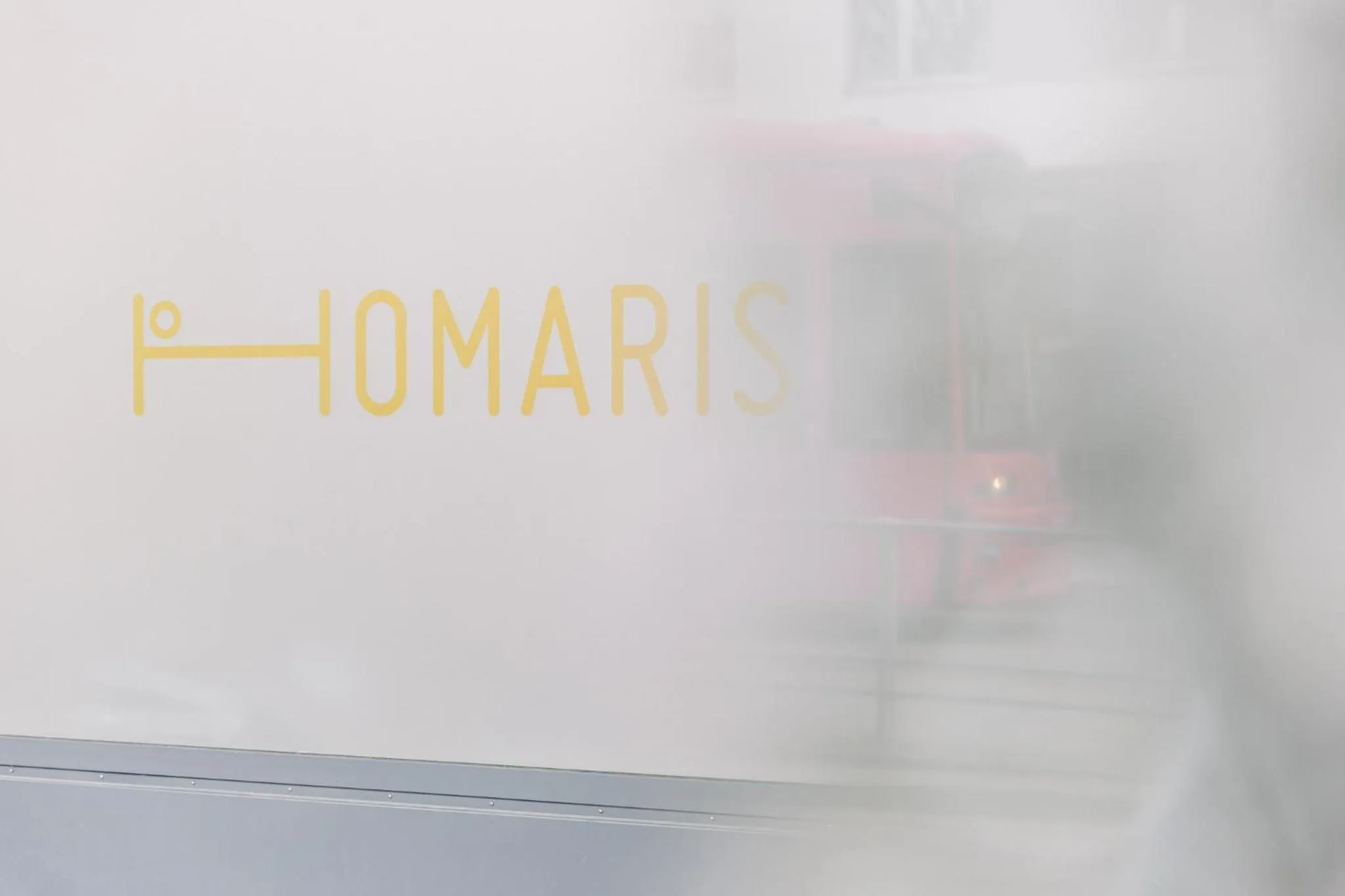 Property logo or sign in Homaris Apartments Frankfurt