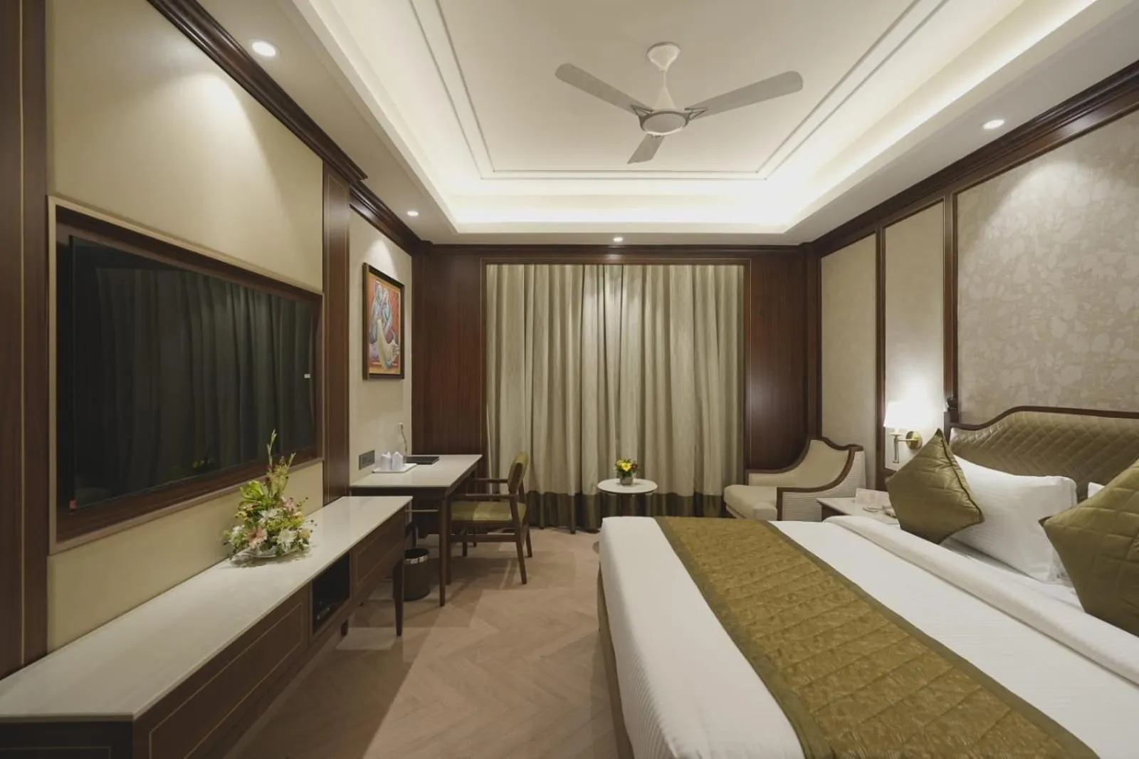 Bed in Chanakya Bnr Hotel