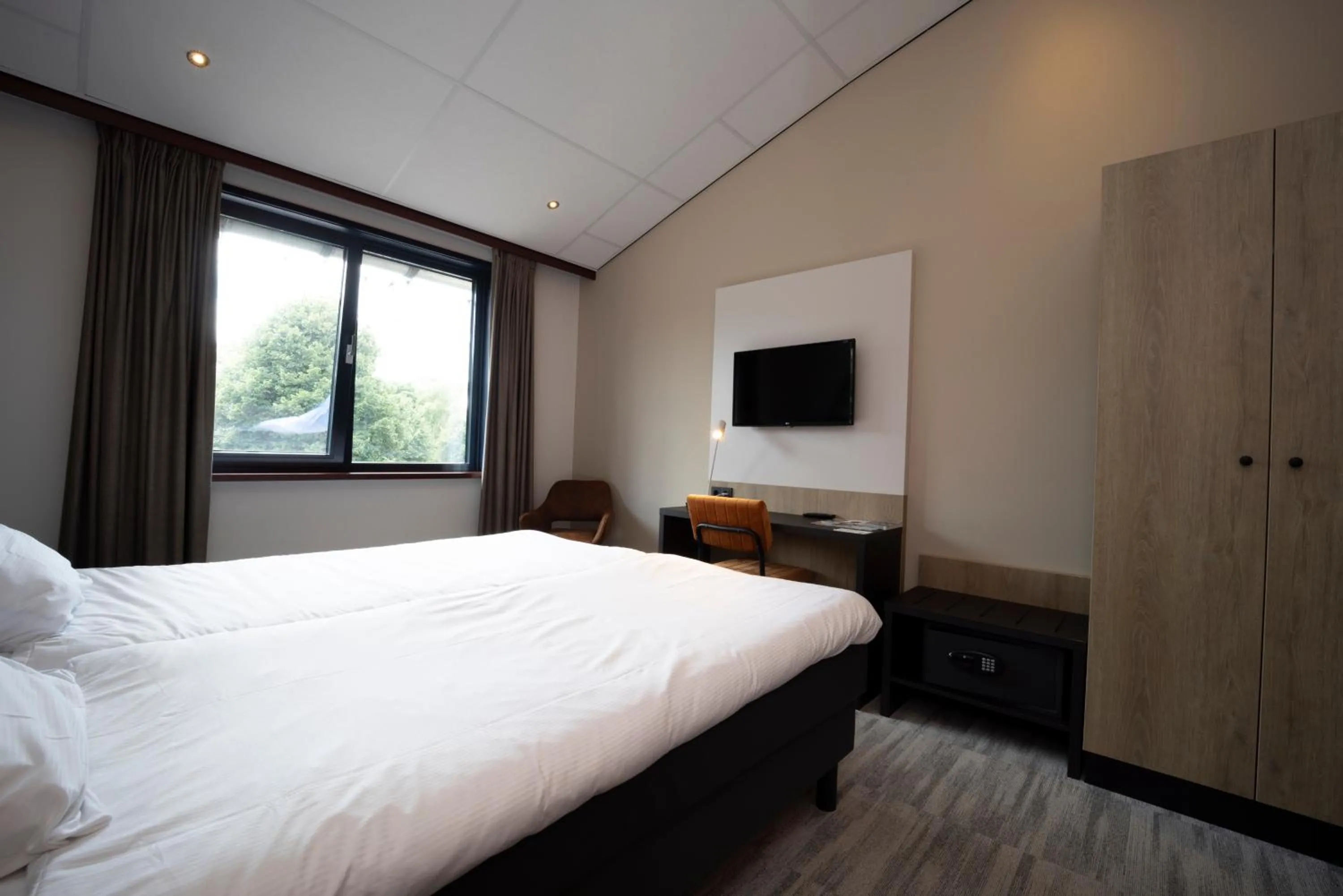 Bed in Fletcher Wellness-Hotel Brabant-Mill