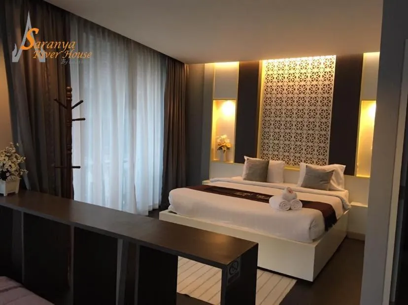 Bed in Saranya River House สรัญญาริเวอร์เฮาส์