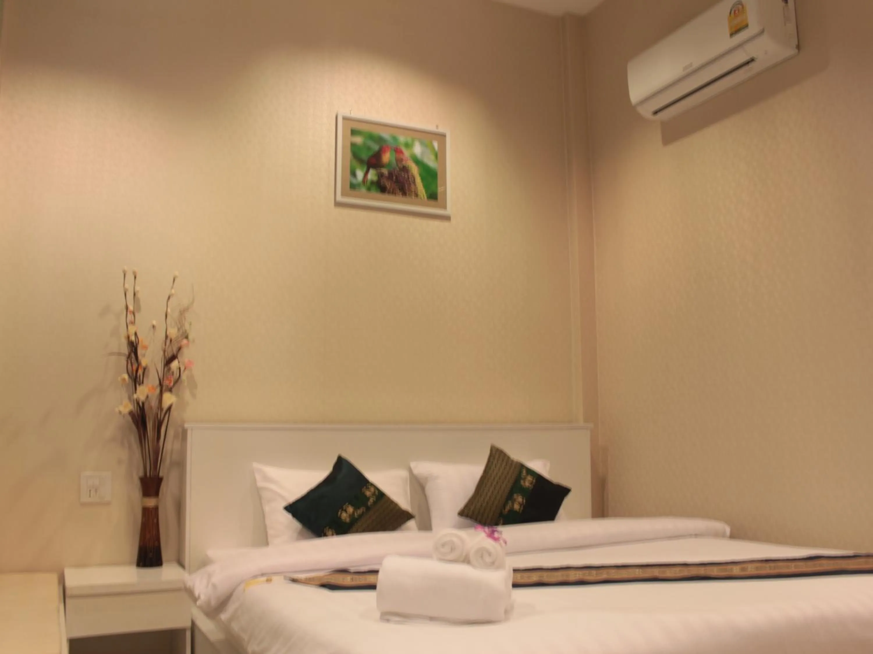 Bed in Saranya River House สรัญญาริเวอร์เฮาส์