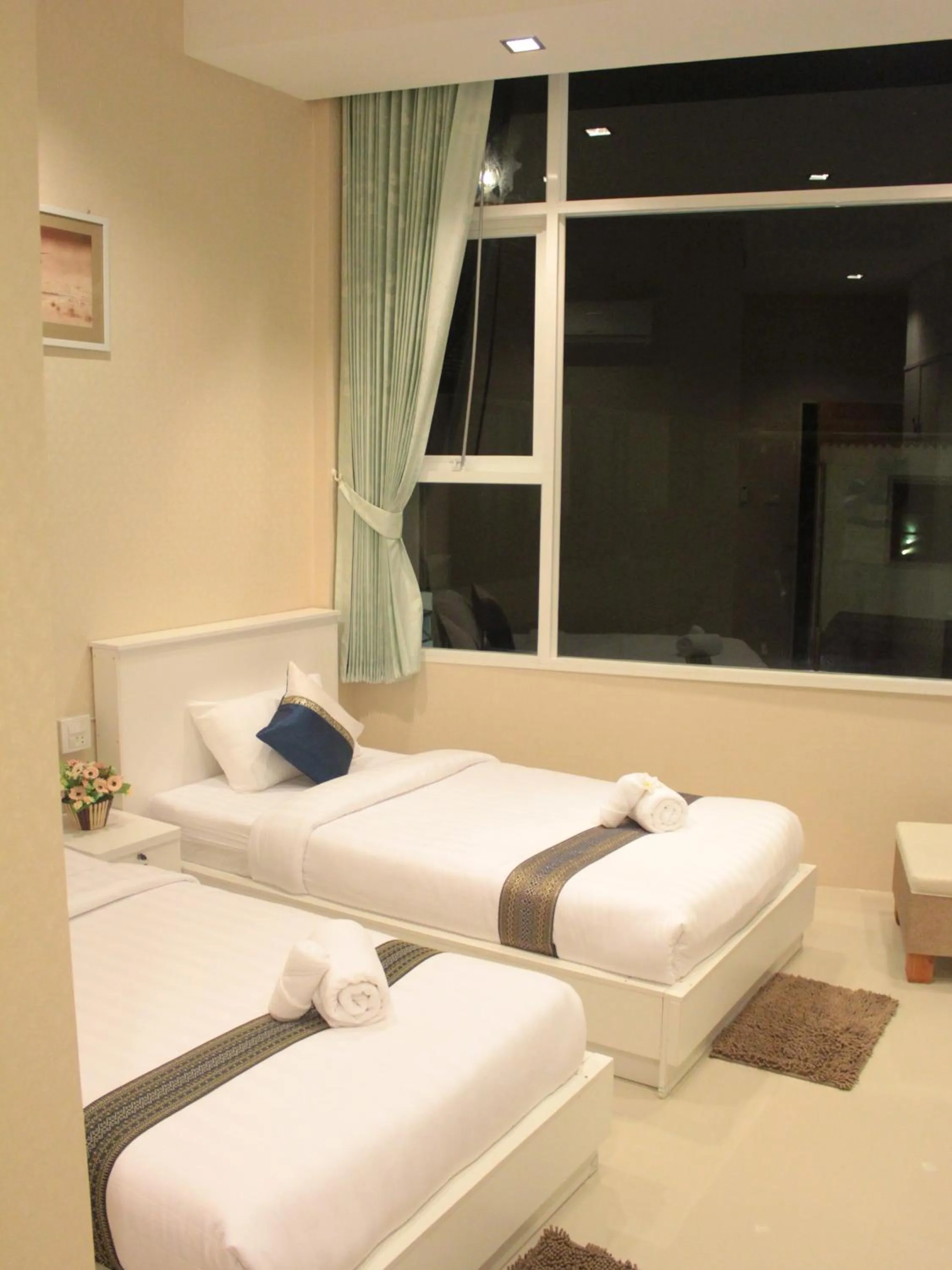 Bed in Saranya River House สรัญญาริเวอร์เฮาส์