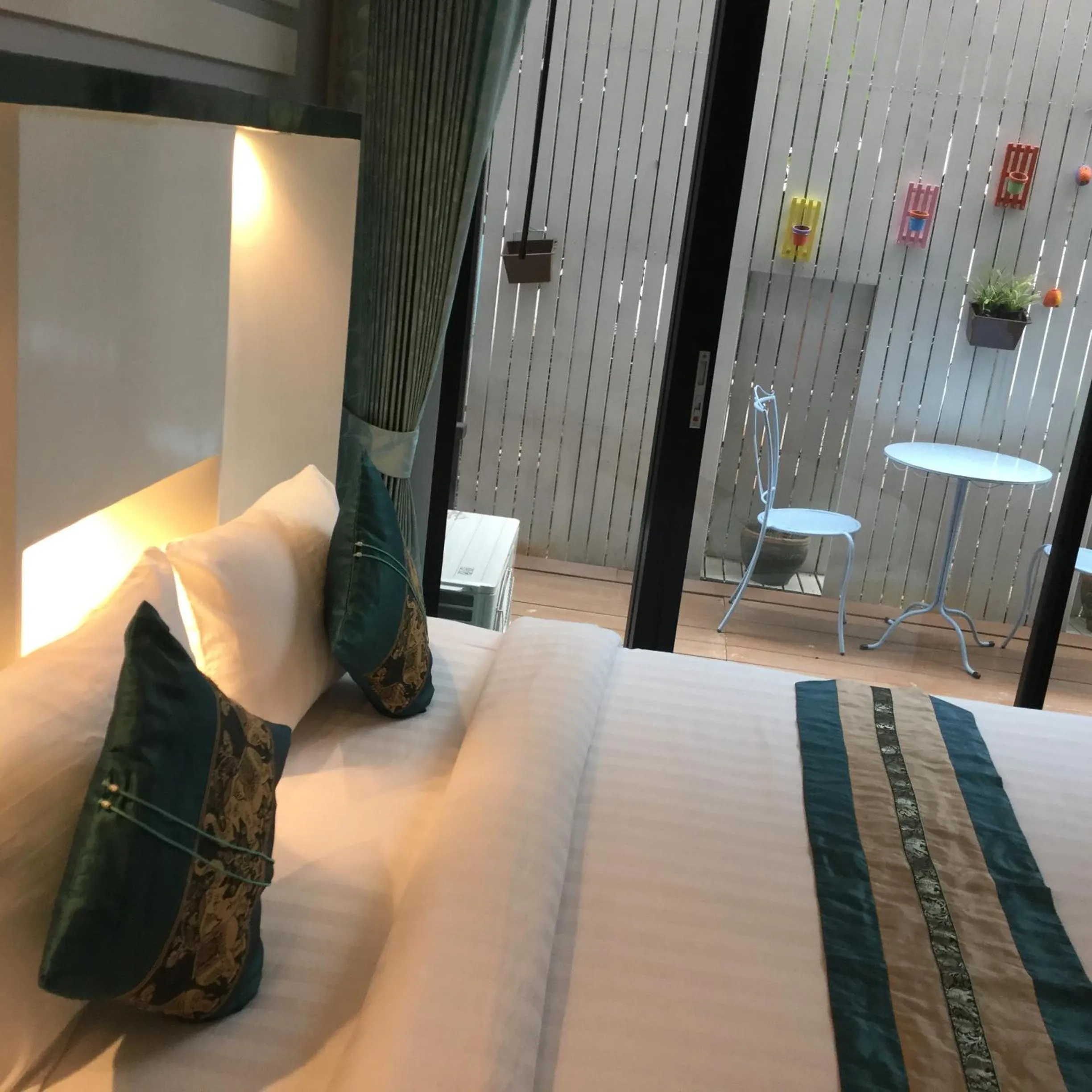 Bed in Saranya River House สรัญญาริเวอร์เฮาส์