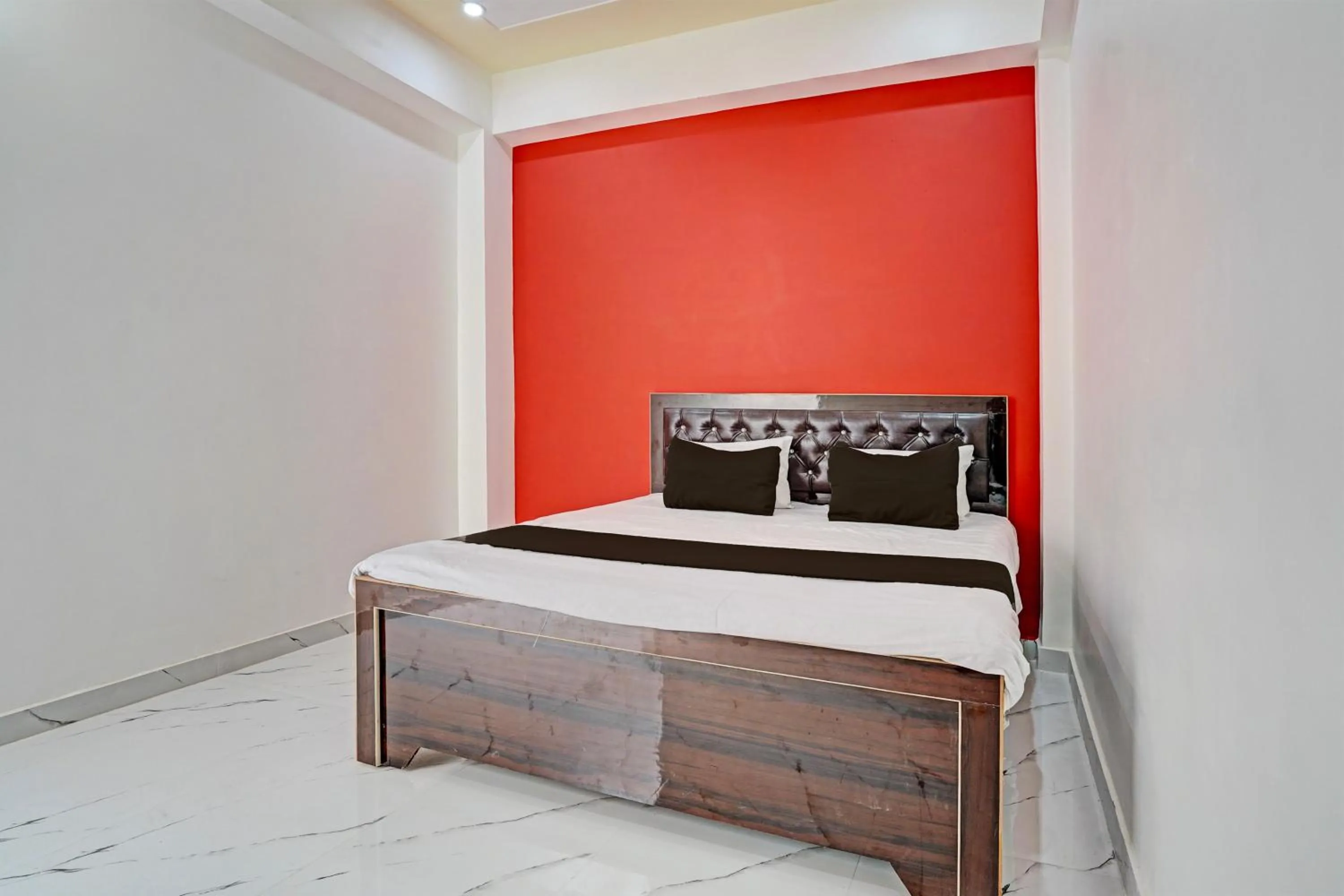 Bedroom in Hotel O by OYO Hira Royal Palace And Lawn