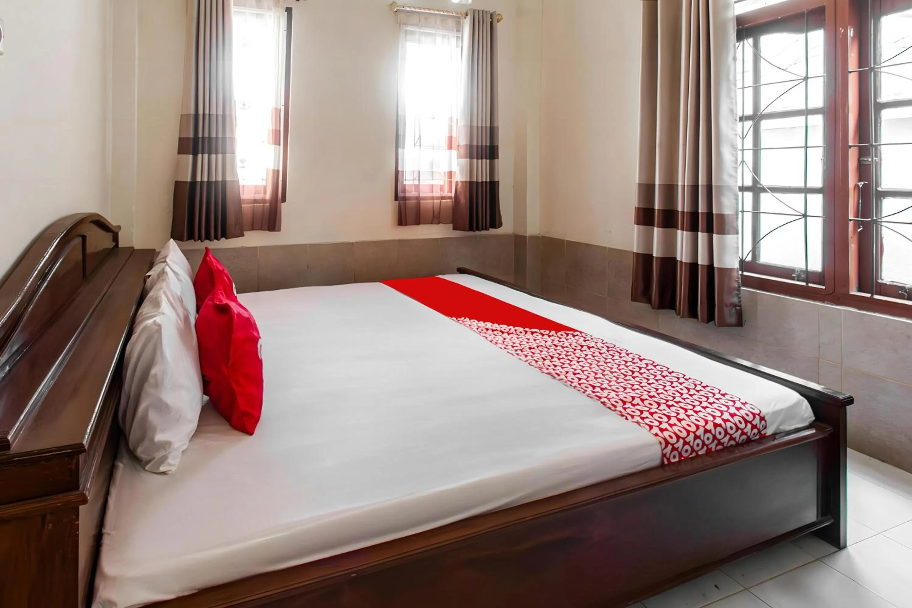 Bedroom in OYO 93582 Liani Homestay Syariah