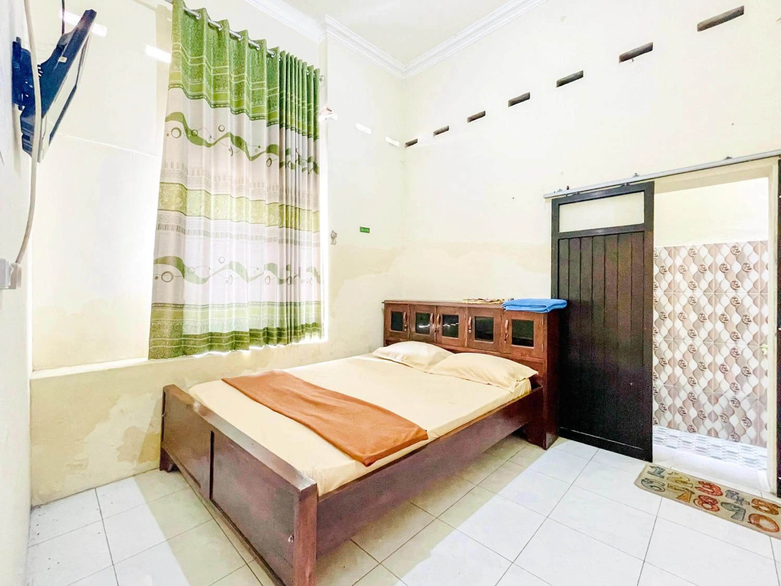 Wisma Air Mancur Malang Mitra RedDoorz