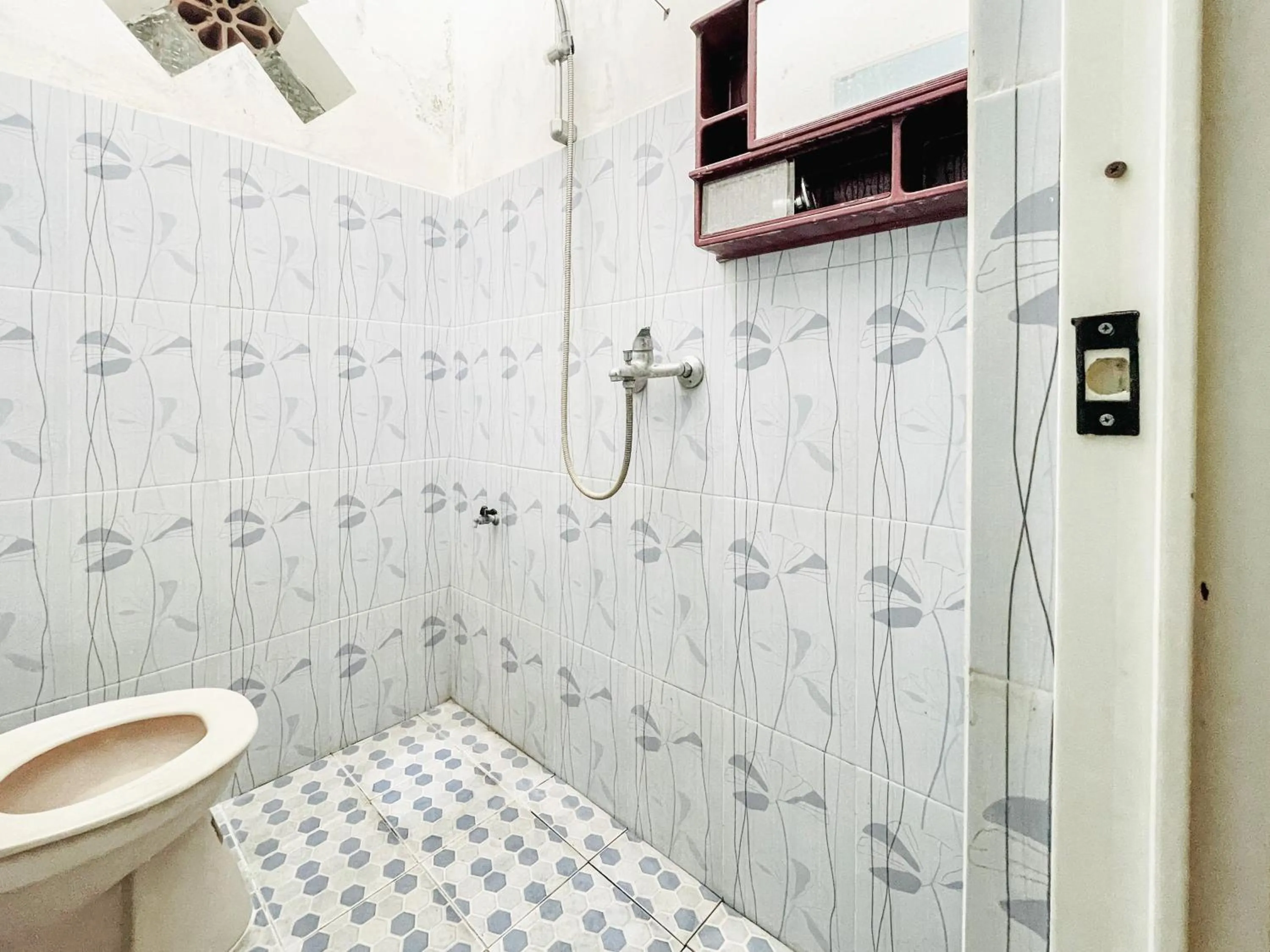 Bathroom in Wisma Air Mancur Malang Mitra RedDoorz