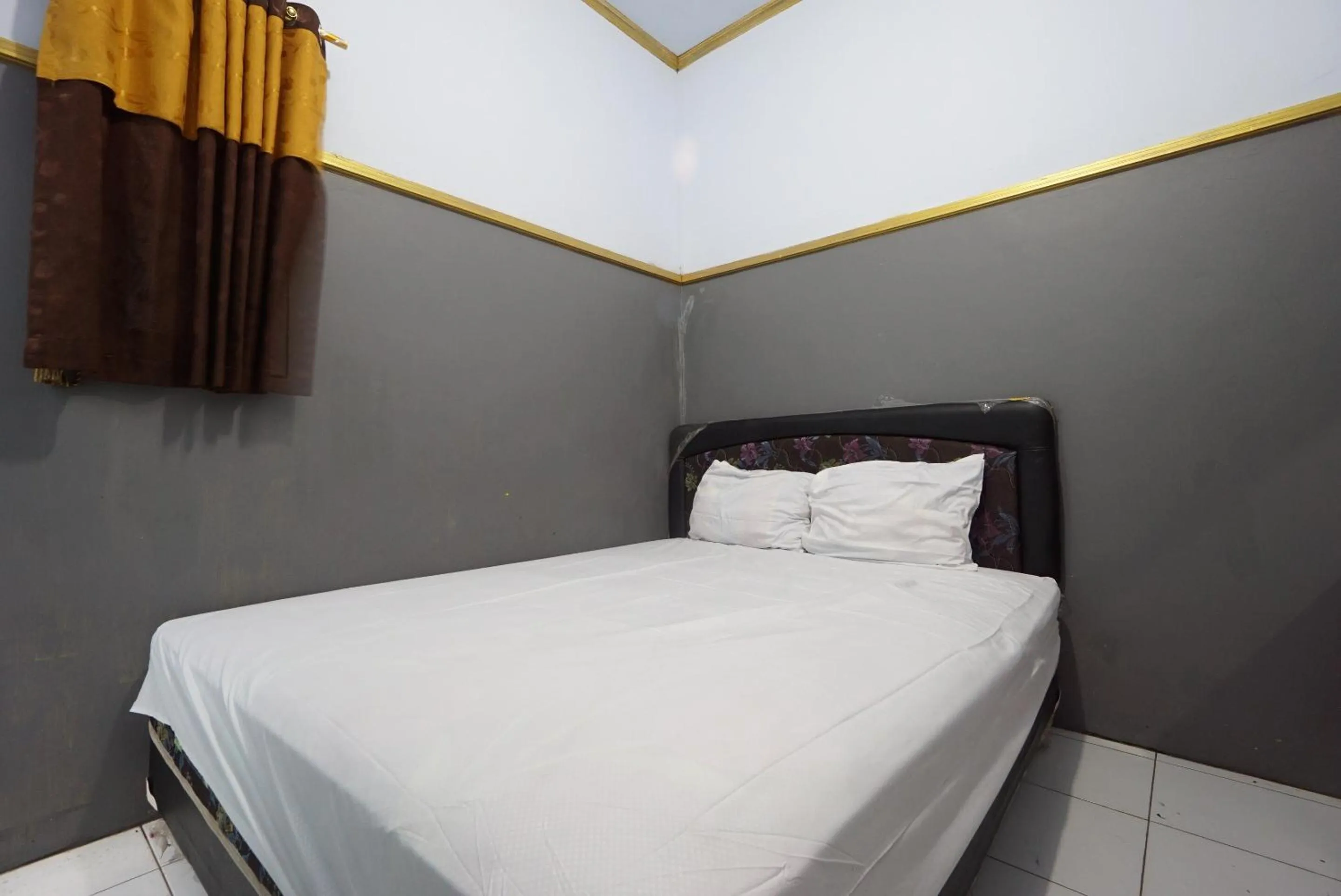 Bedroom in SPOT ON 93620 Anisa Homestay Syariah Near Pantai Gemah Tulungaggung
