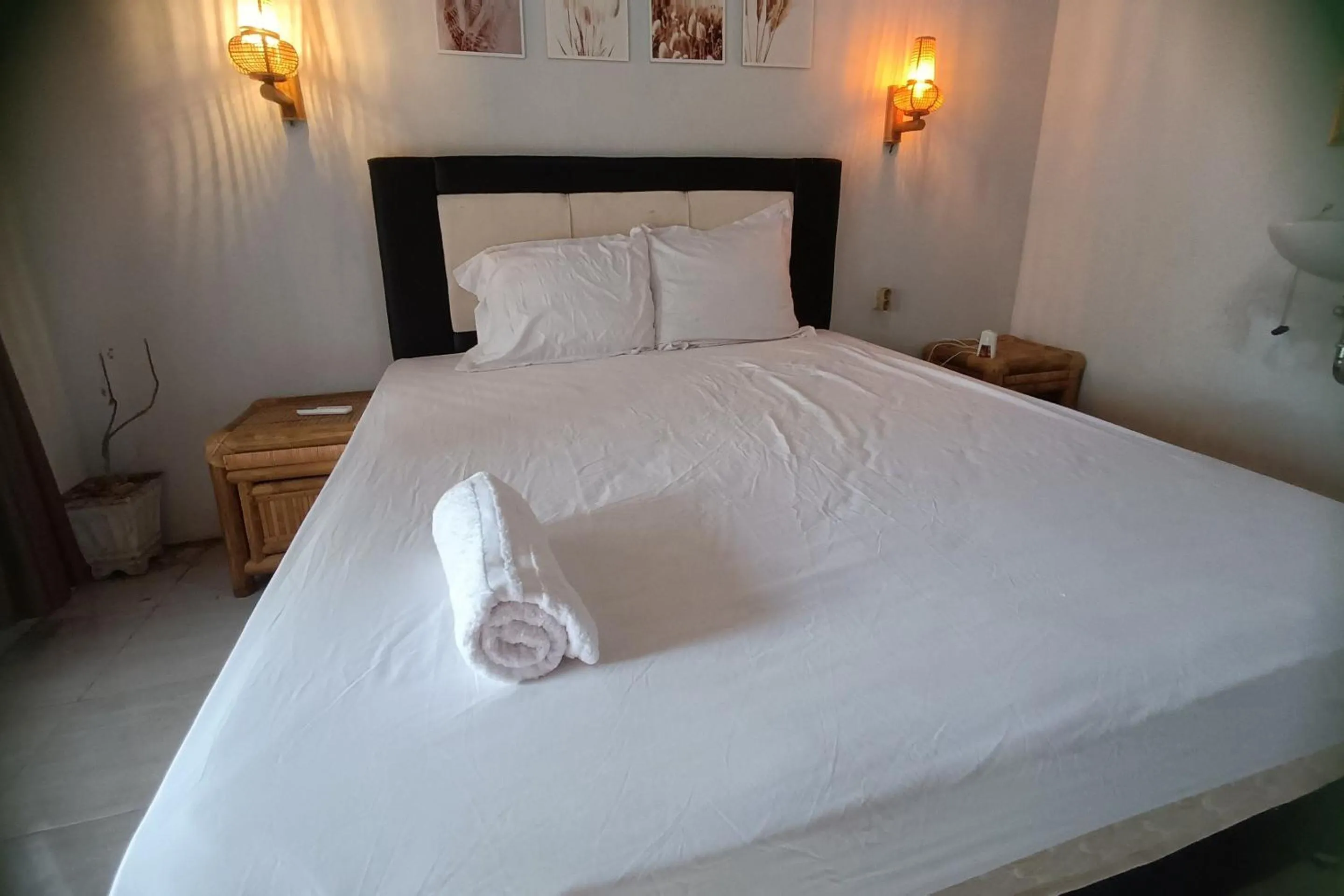 Bedroom in OYO 93626 Hi Homestay & Group