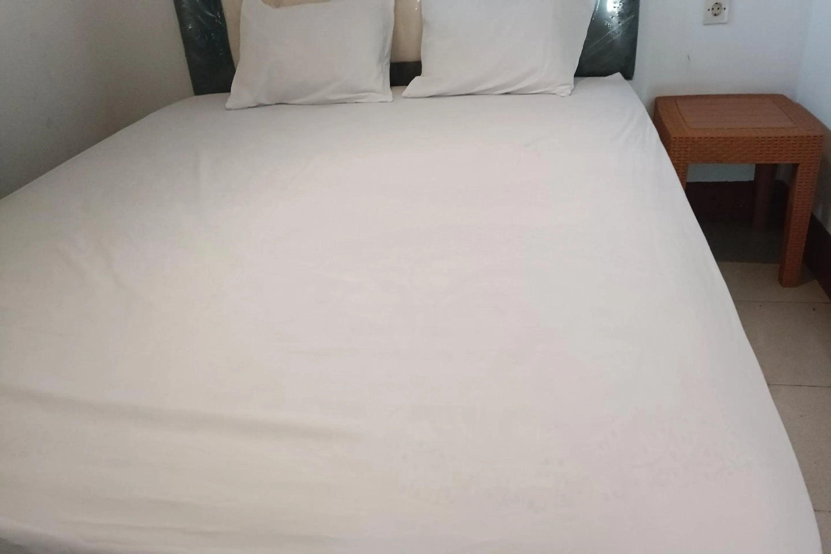 Bedroom in OYO 93626 Hi Homestay & Group