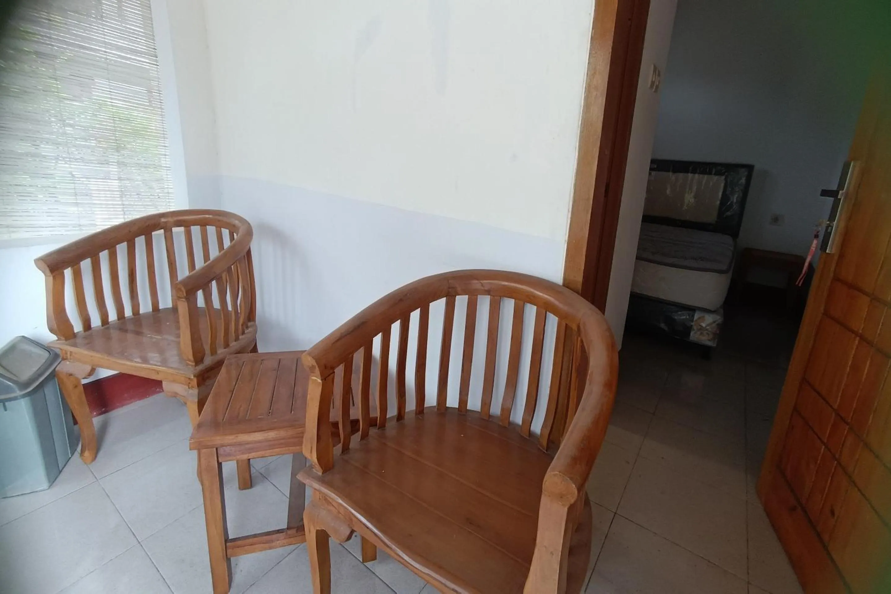 Bedroom in OYO 93626 Hi Homestay & Group