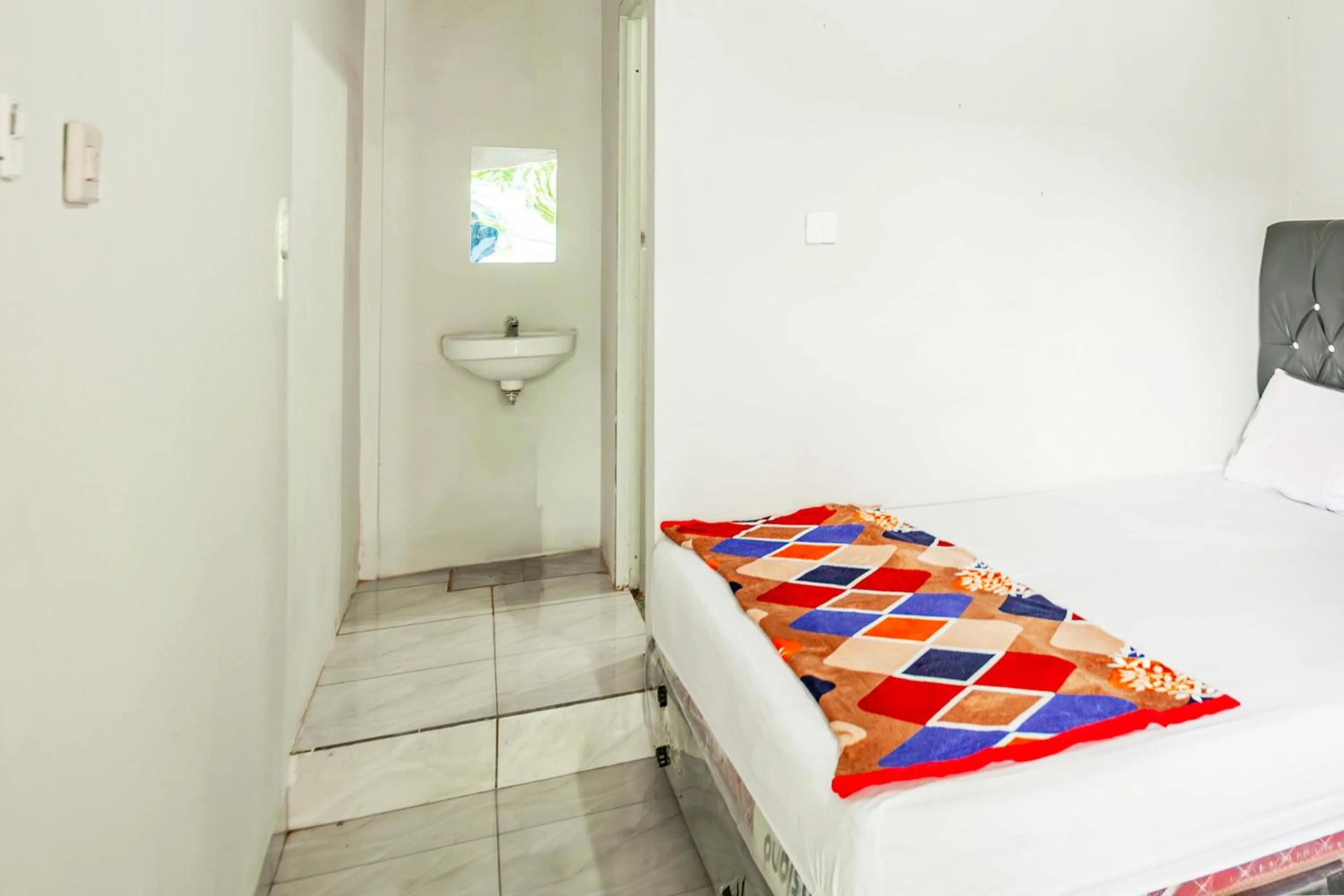 Bedroom, Bed in Hotel O Wongso Residence Syariah