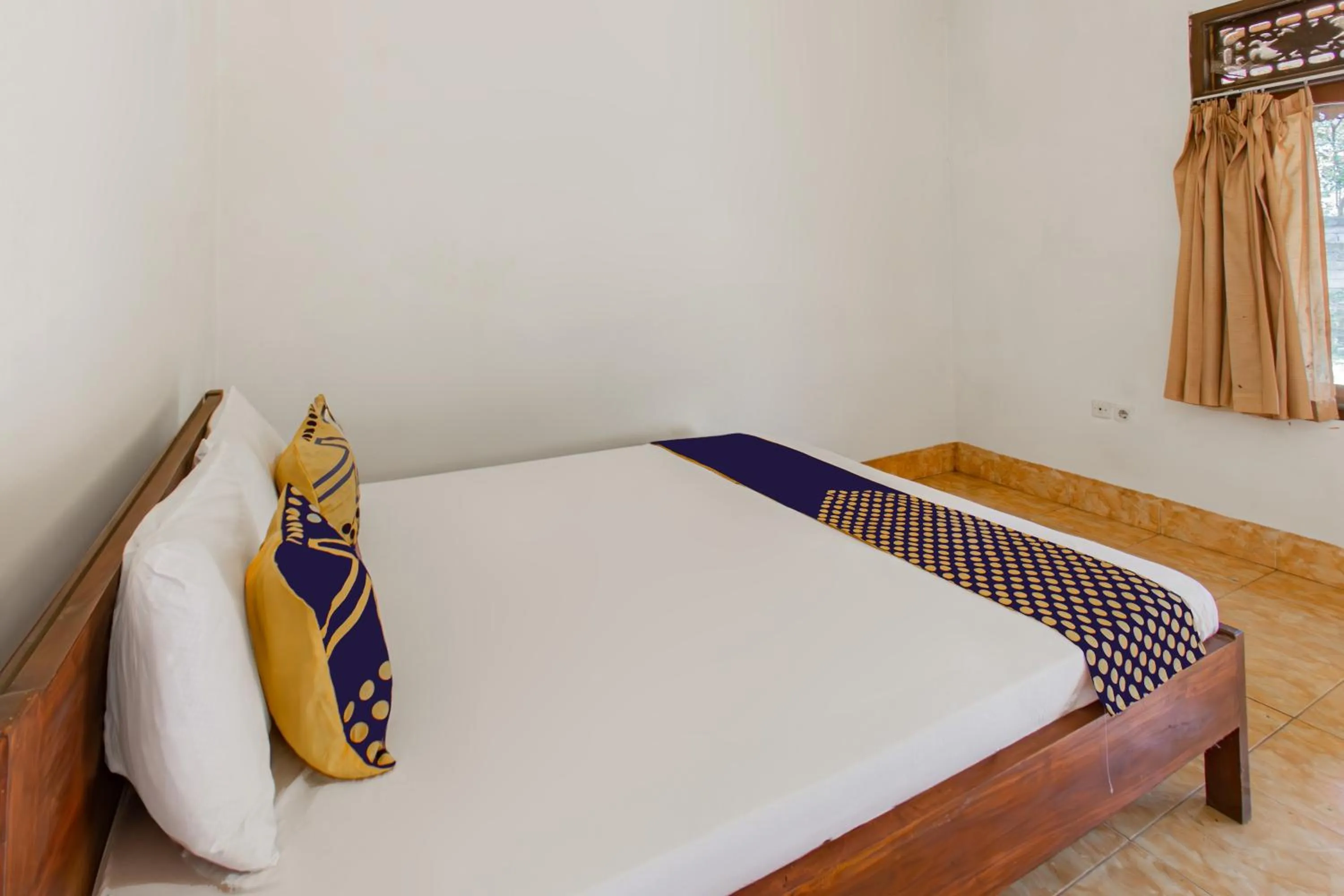 Bedroom, Bed in Hotel O Kaila Guesthouse