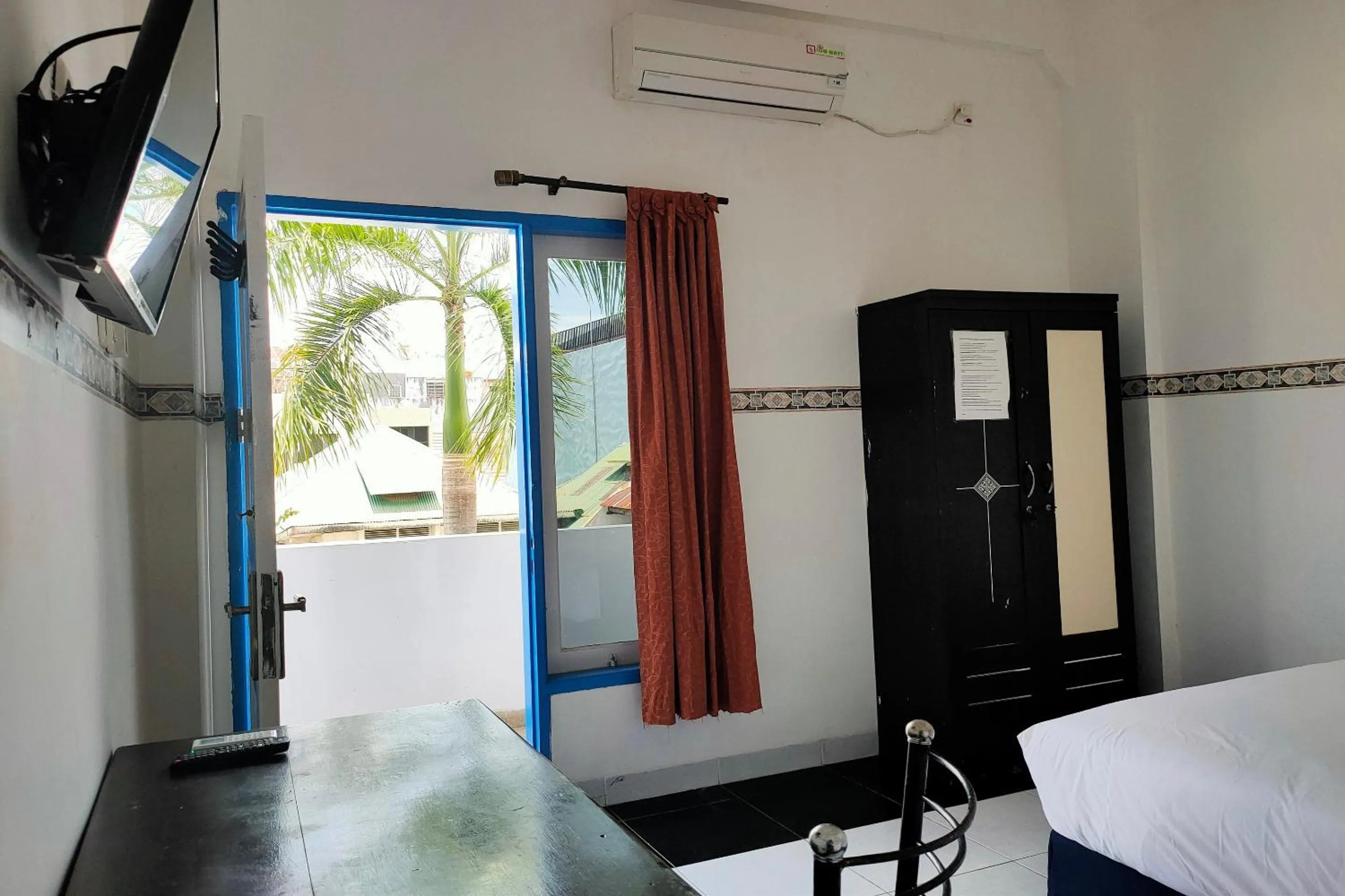 Bedroom in Hotel O Pondok Baruga 777 Near Sarewo Musik Studio Kendari