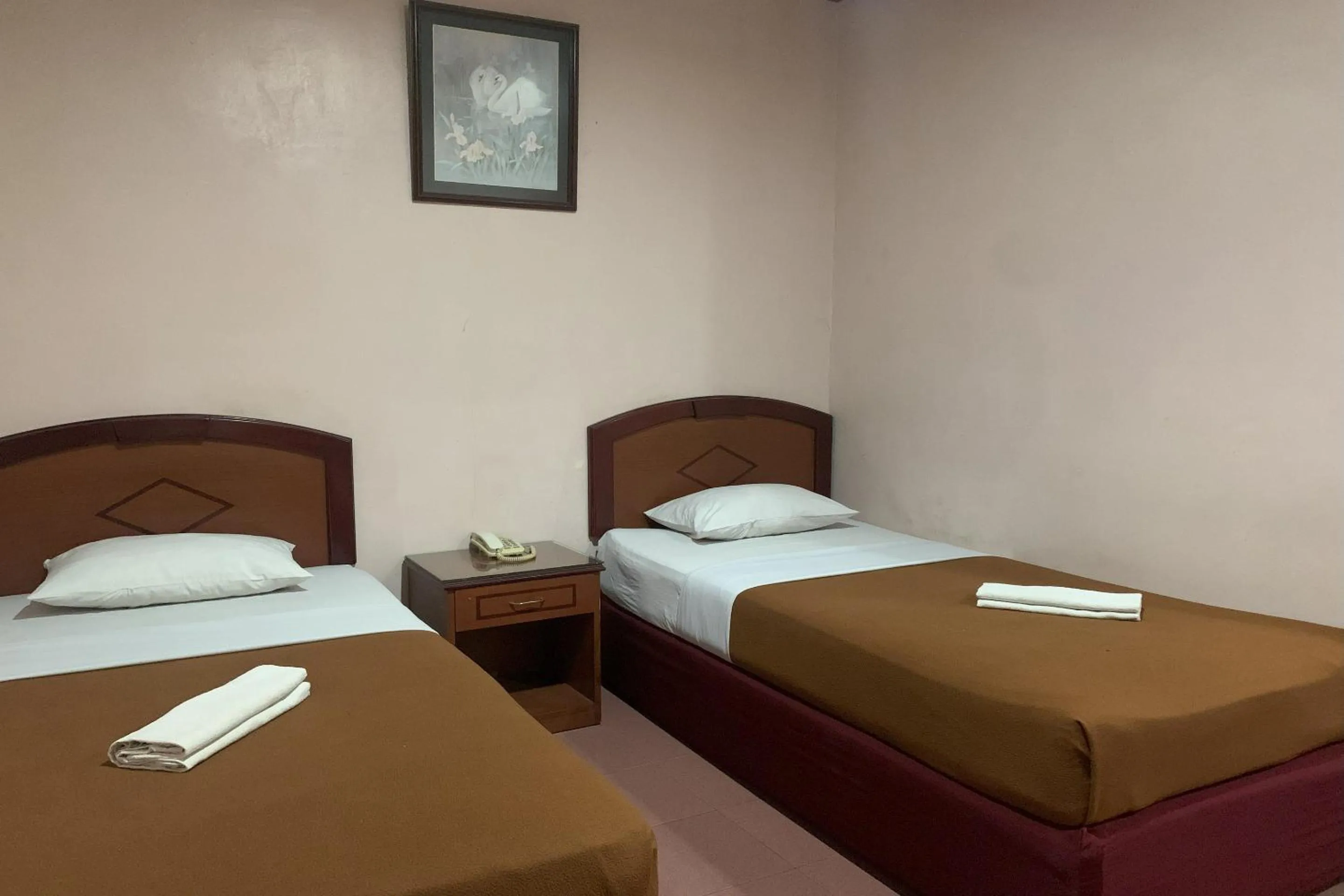 Bedroom in Hotel O Pondok Baruga 777 Near Sarewo Musik Studio Kendari