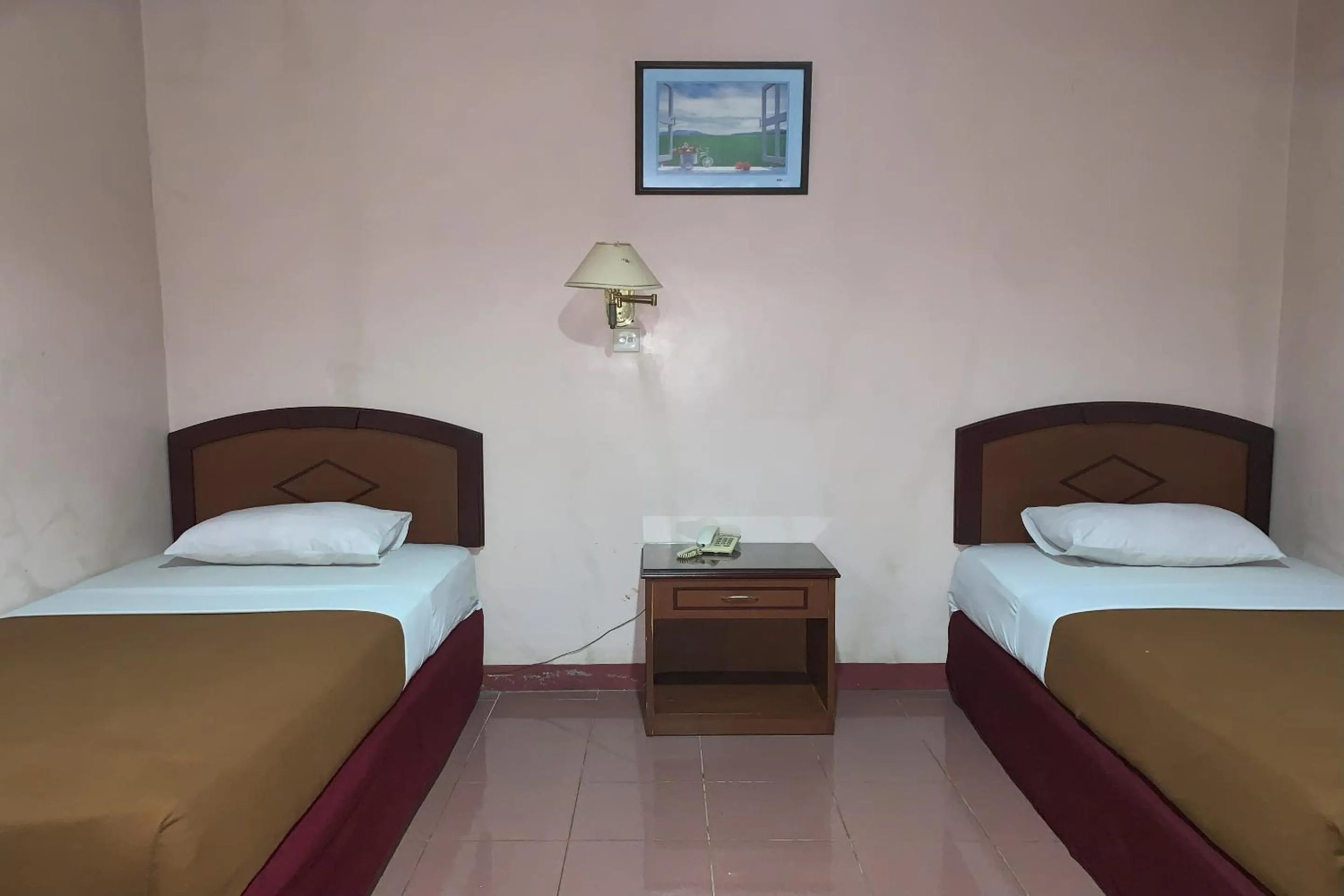 Bedroom in Hotel O Pondok Baruga 777 Near Sarewo Musik Studio Kendari