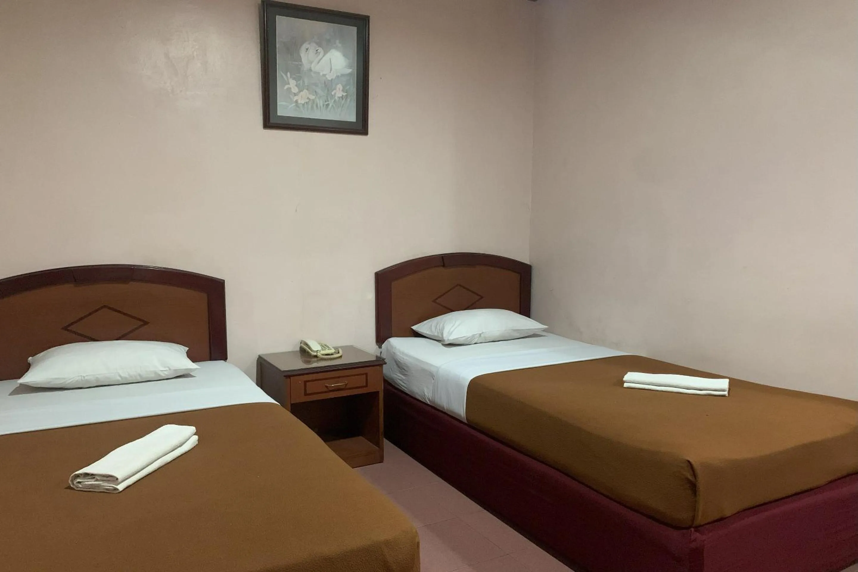 Bedroom in Hotel O Pondok Baruga 777 Near Sarewo Musik Studio Kendari