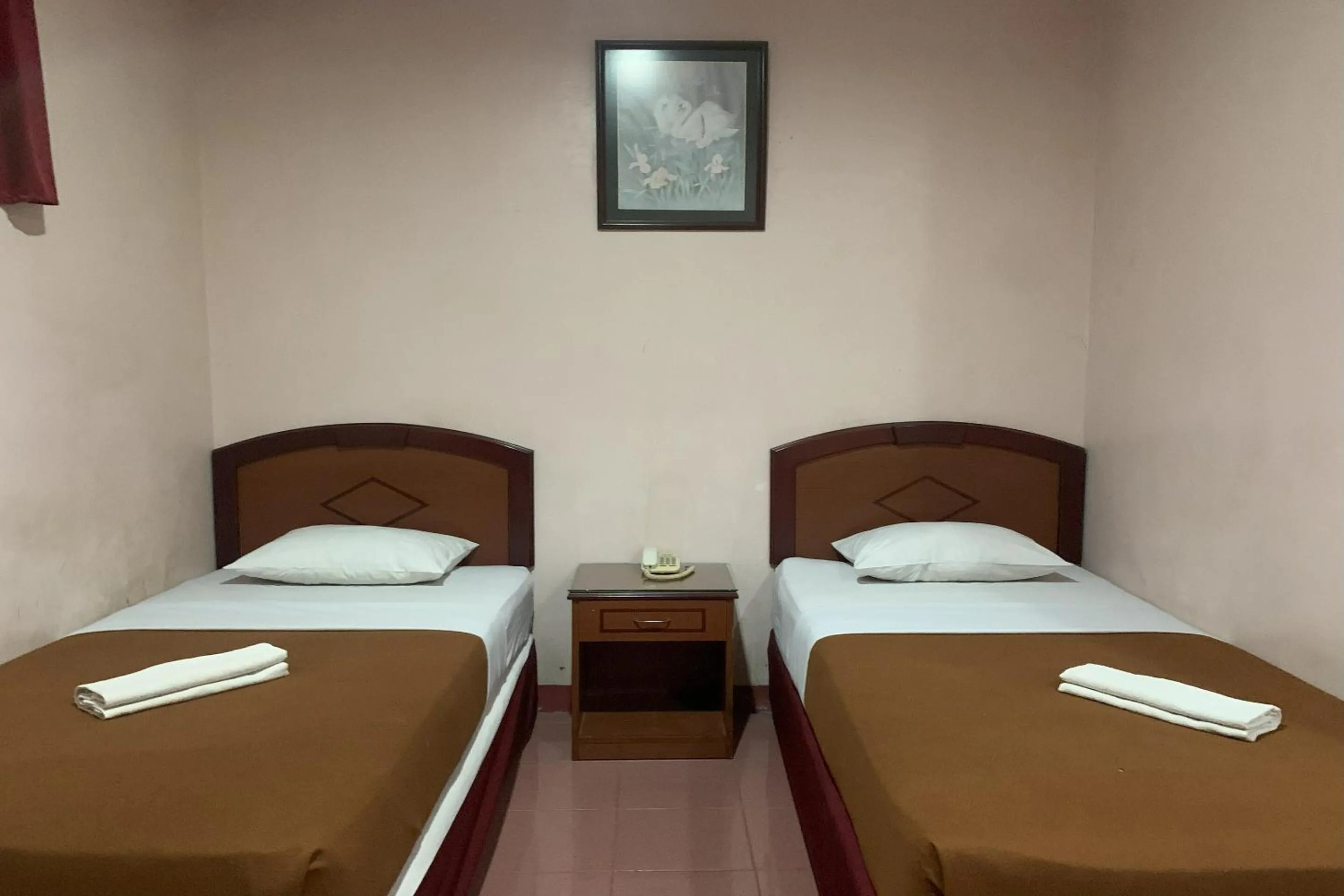 Bedroom in Hotel O Pondok Baruga 777 Near Sarewo Musik Studio Kendari