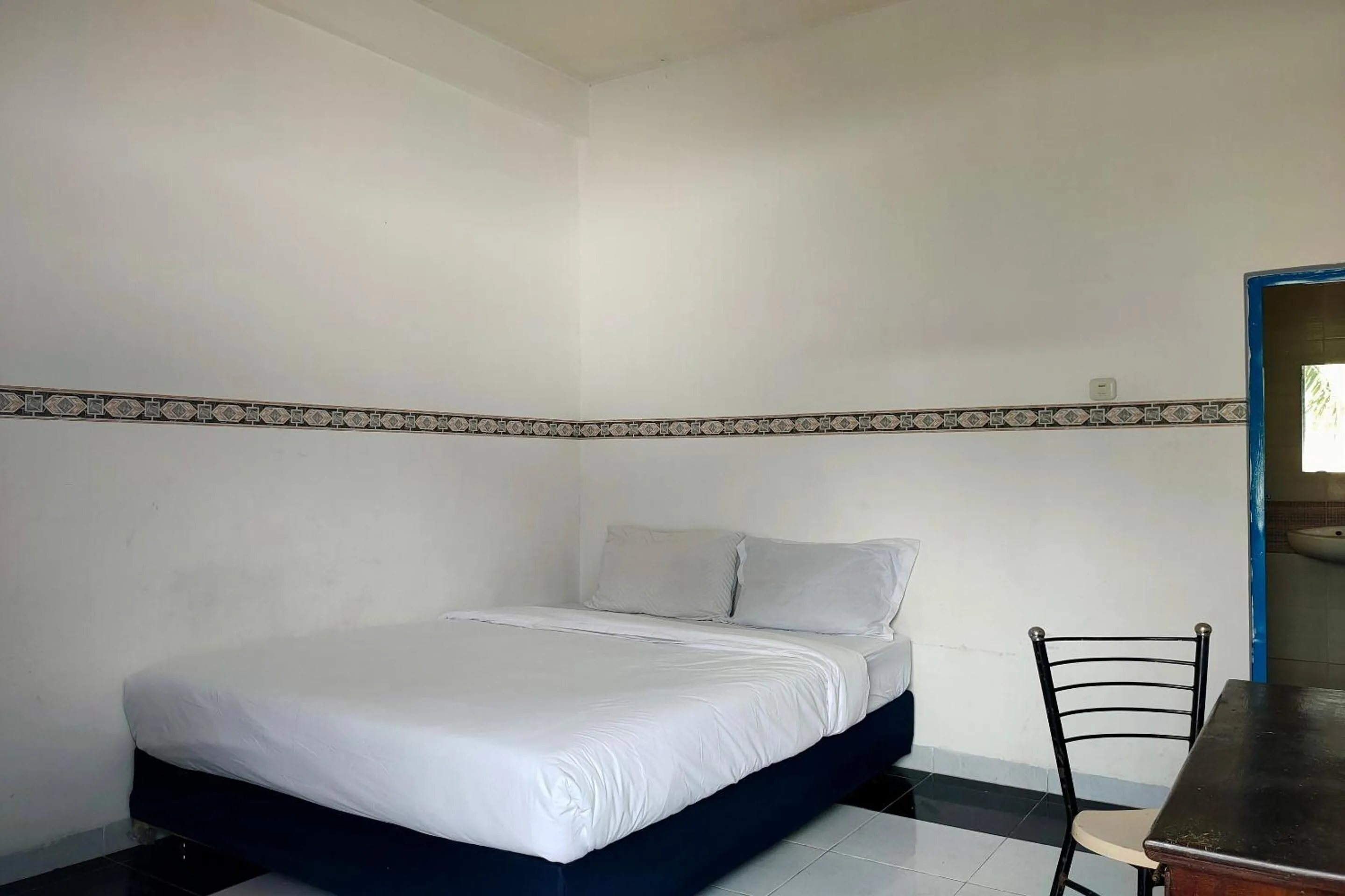 Bedroom in Hotel O Pondok Baruga 777 Near Sarewo Musik Studio Kendari