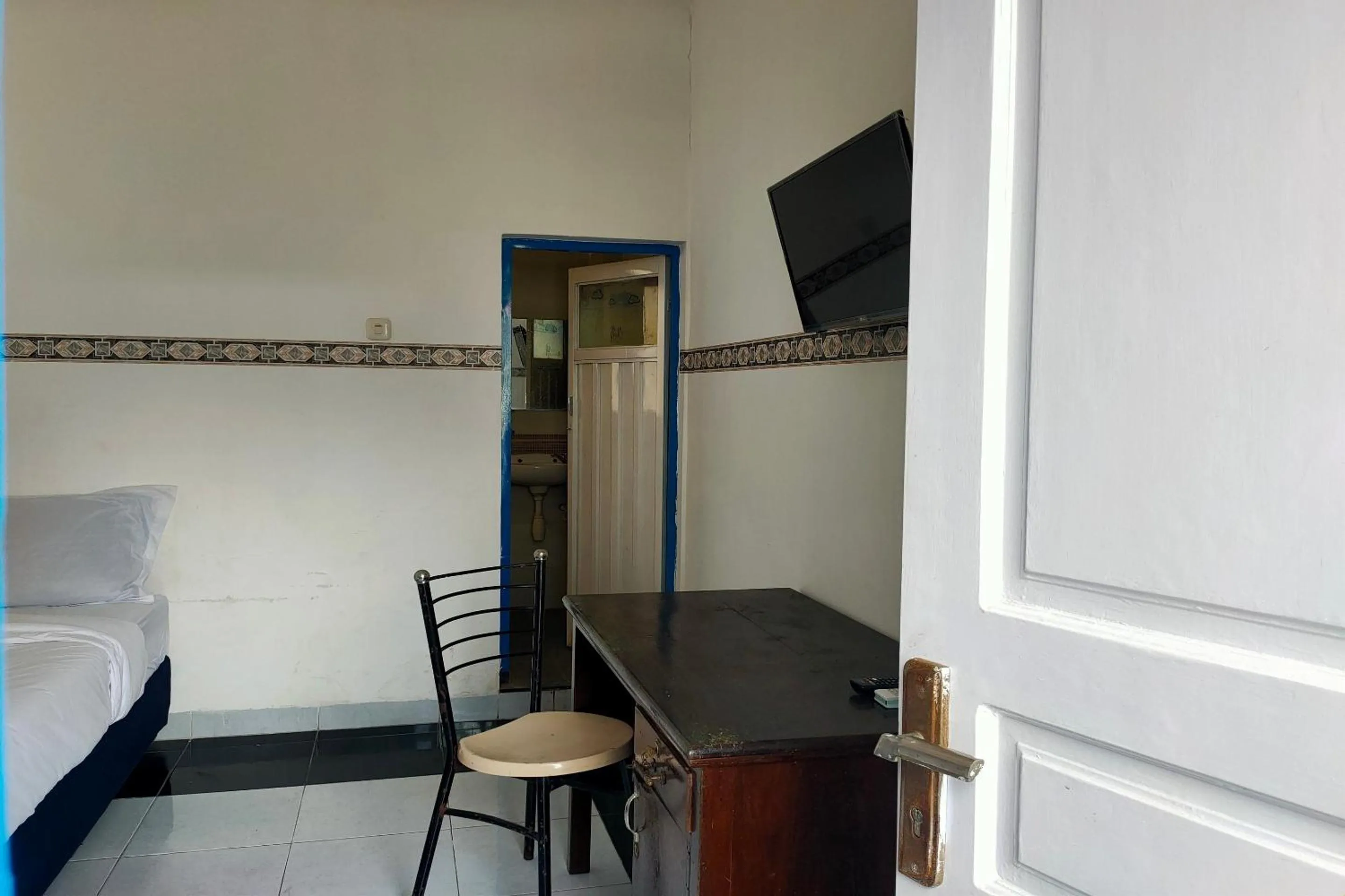 Bedroom in Hotel O Pondok Baruga 777 Near Sarewo Musik Studio Kendari