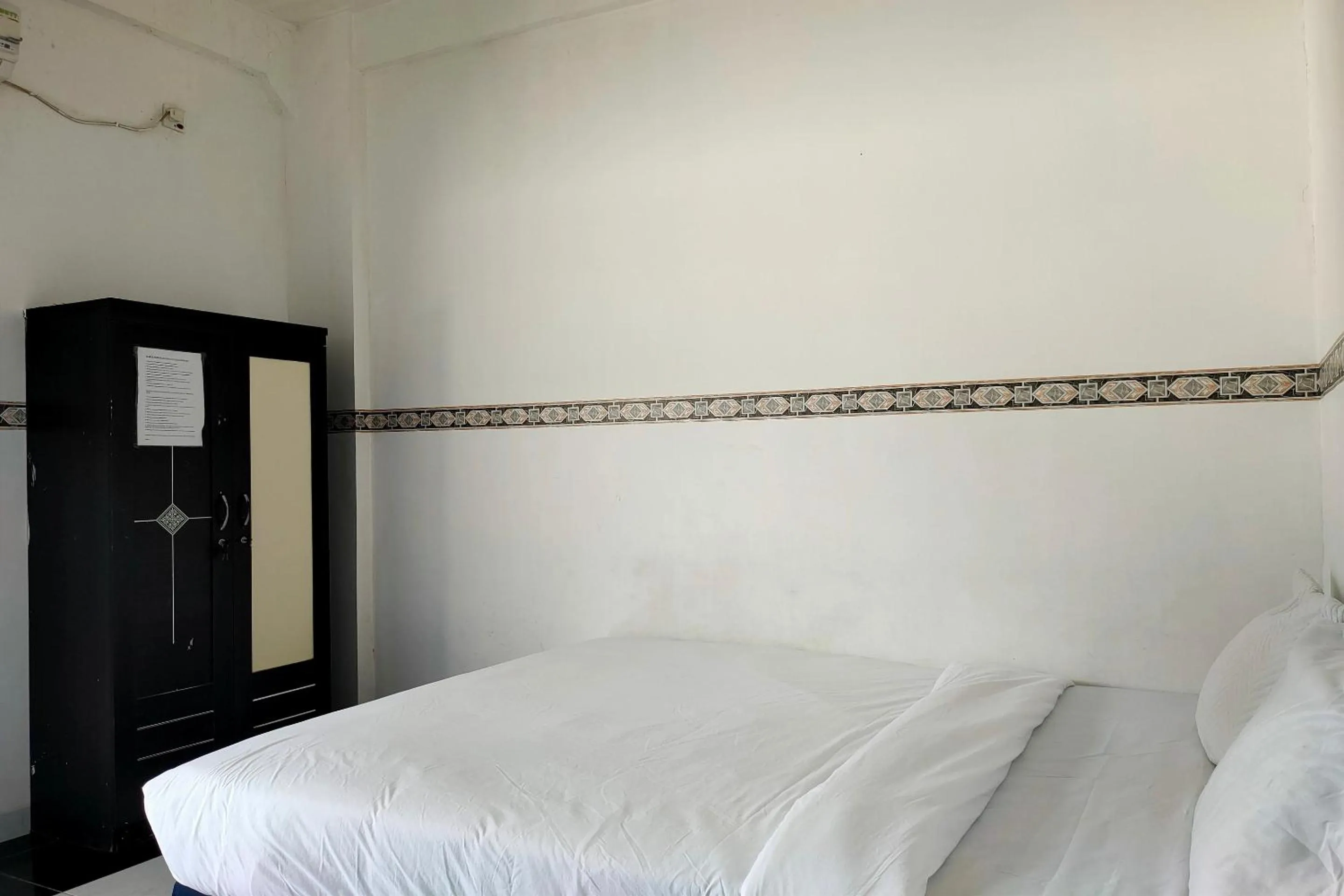 Bedroom in Hotel O Pondok Baruga 777 Near Sarewo Musik Studio Kendari