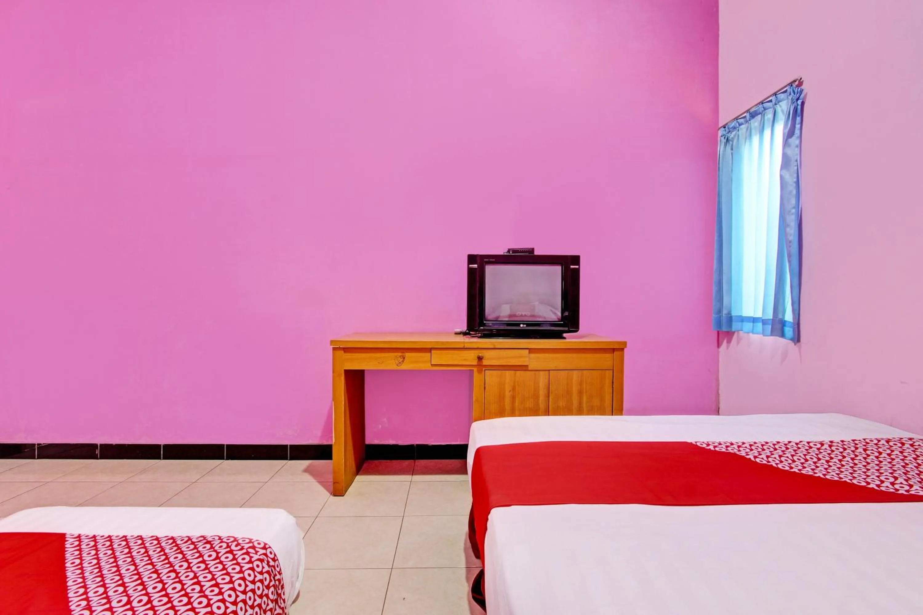Bedroom in OYO 93660 New Family Hotel Syariah