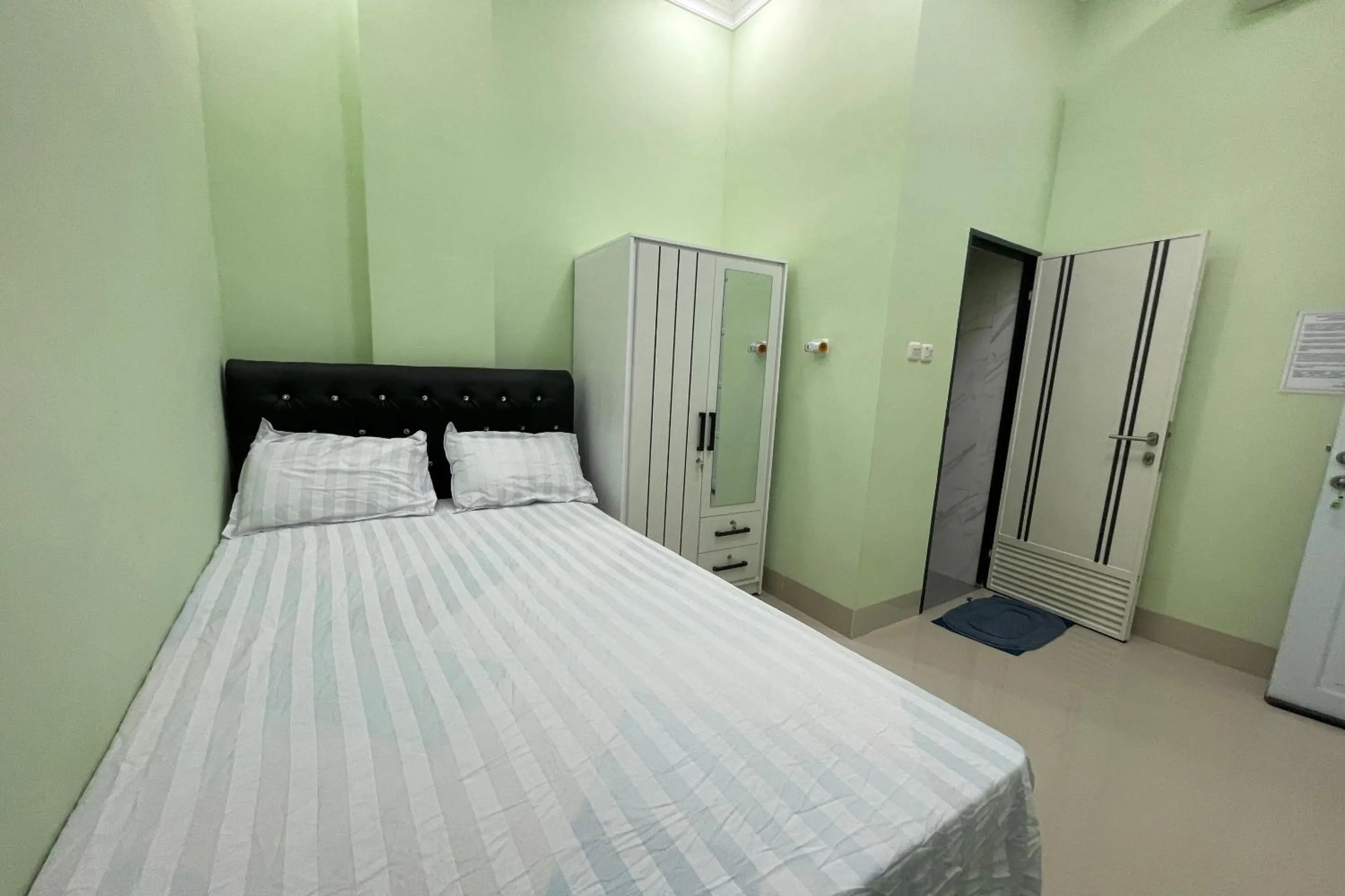 Bedroom, Bed in Hotel O Homestay Purirano