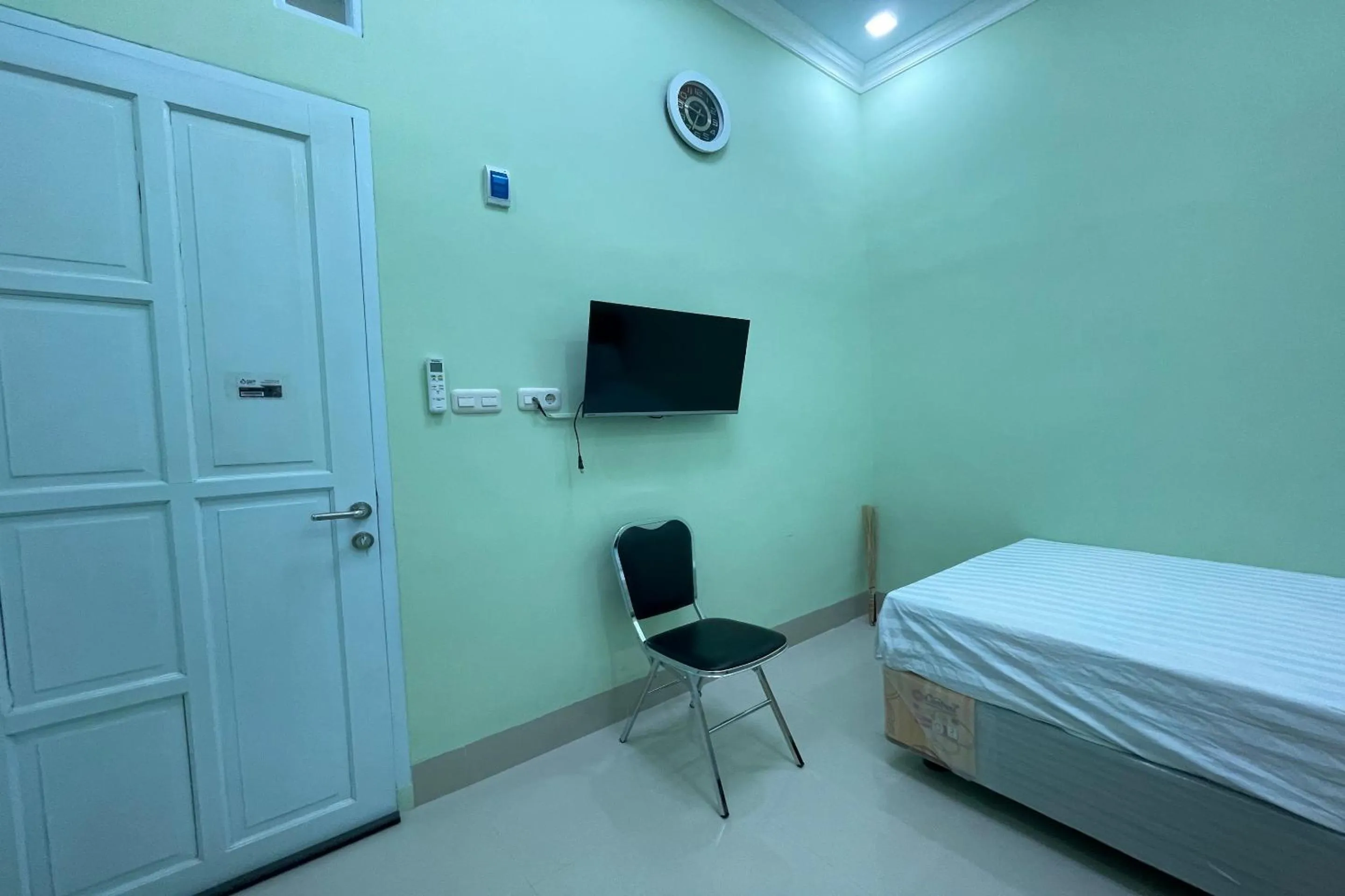 Bedroom, Bed in Hotel O Homestay Purirano