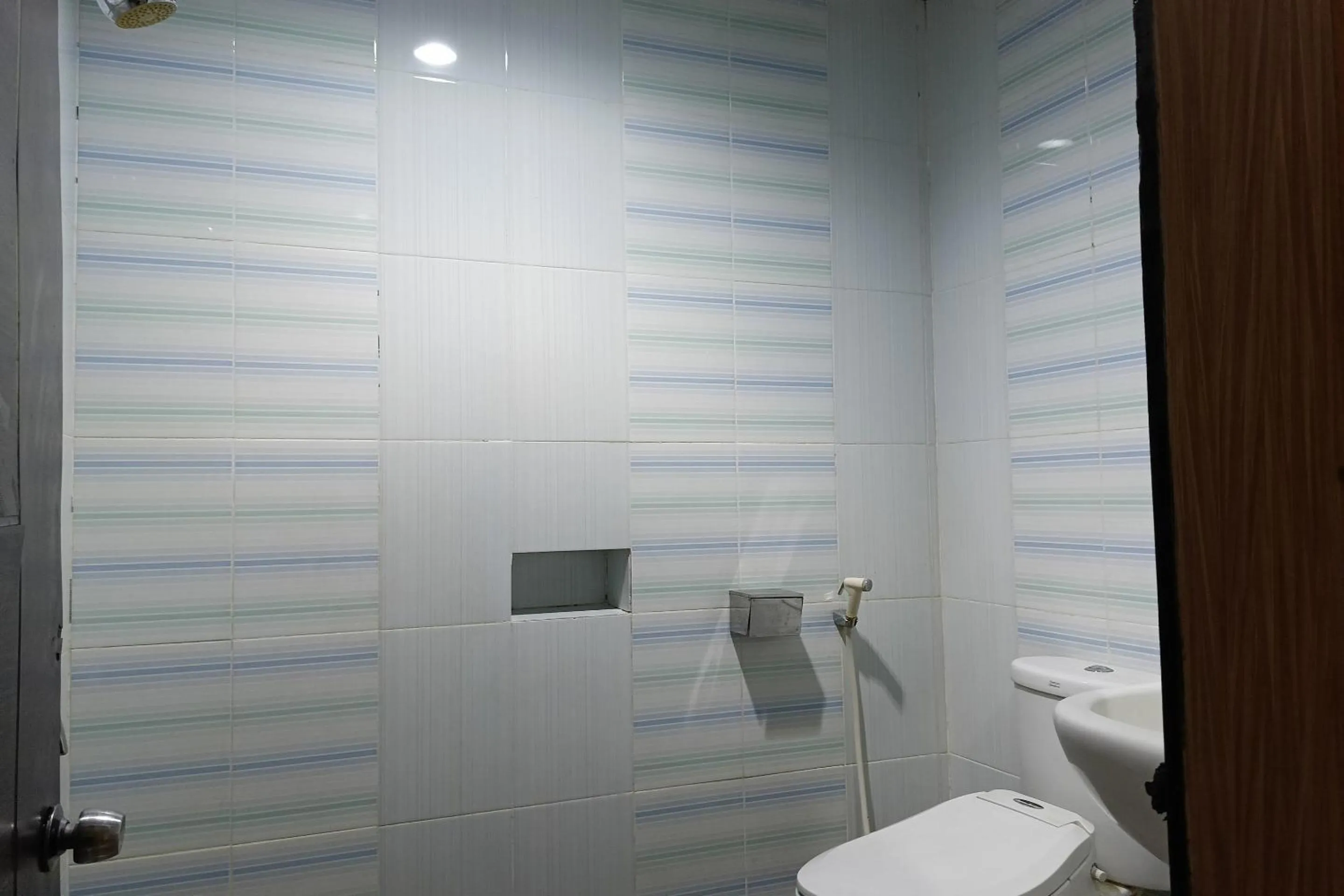 Bathroom in Hotel O Puri Homestay