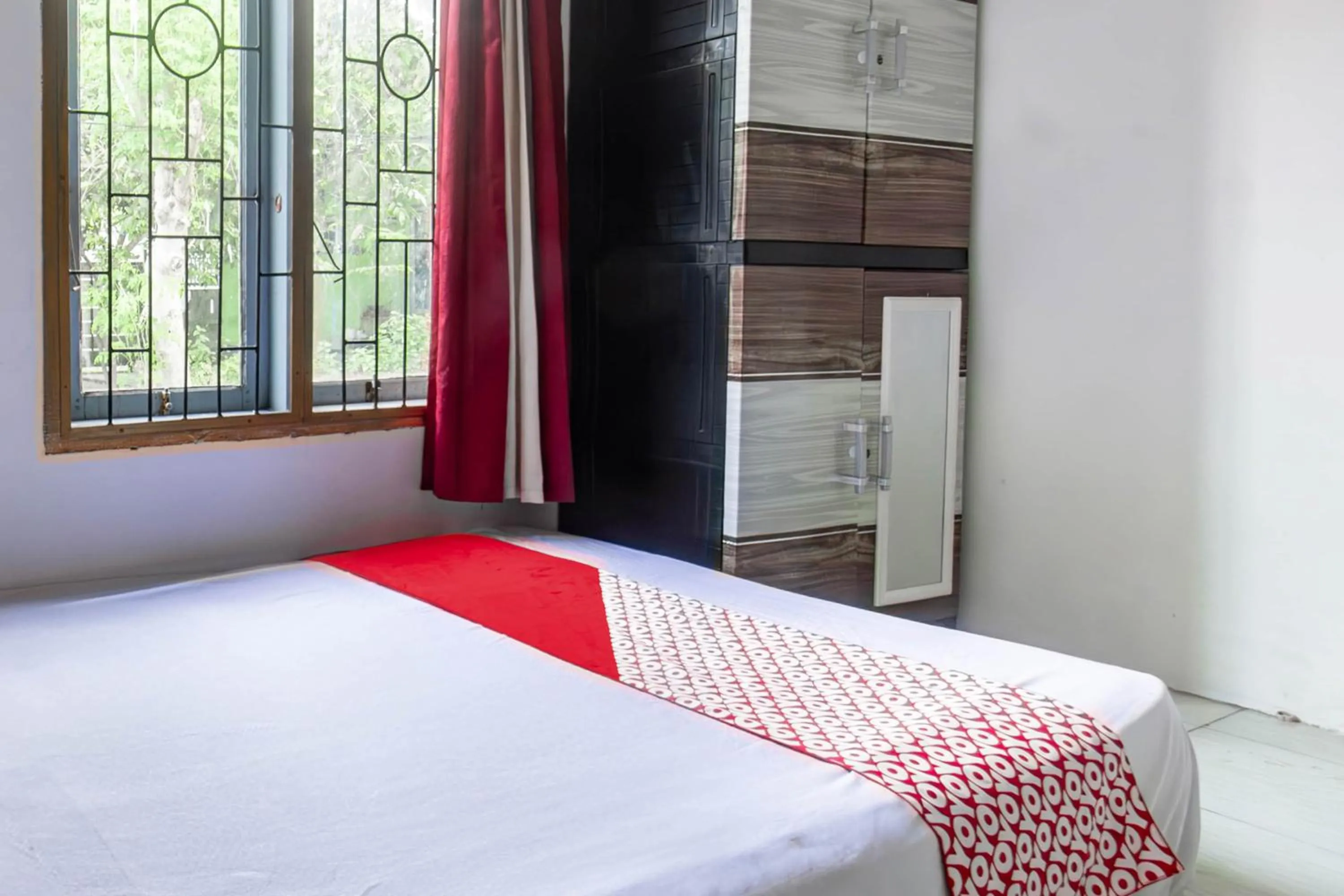 Bedroom, Bed in Hotel O Lestari Homestay
