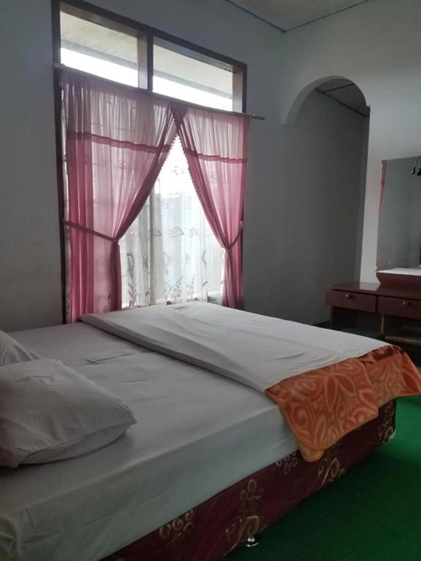 Bed in Kaliaga Bungalow