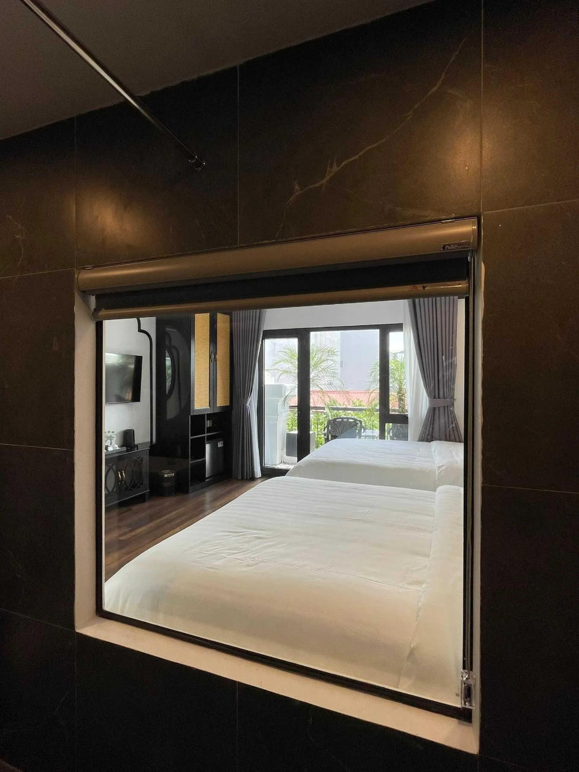 Bed in Aquarius Premium Hotel