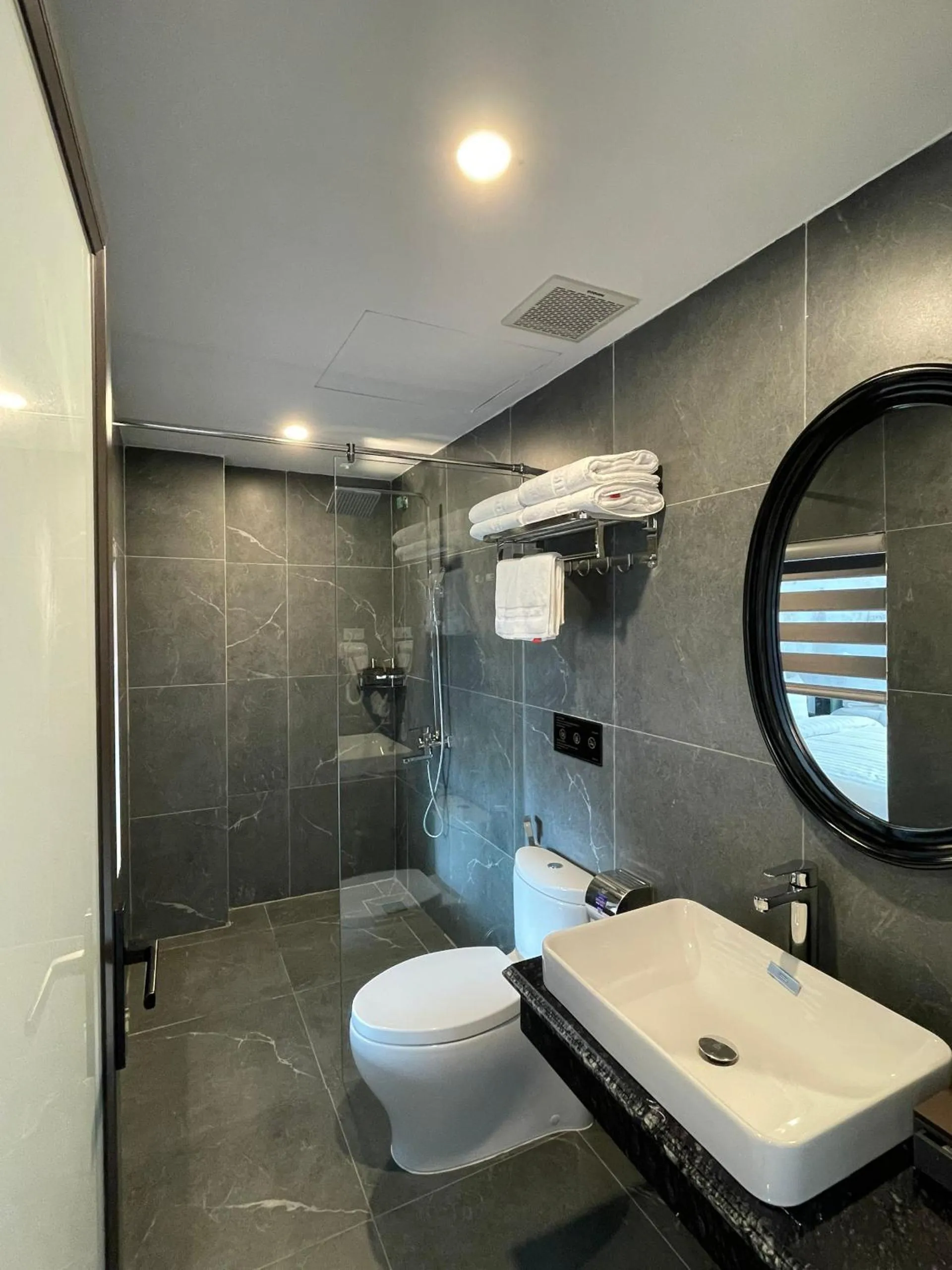 Toilet in Aquarius Premium Hotel