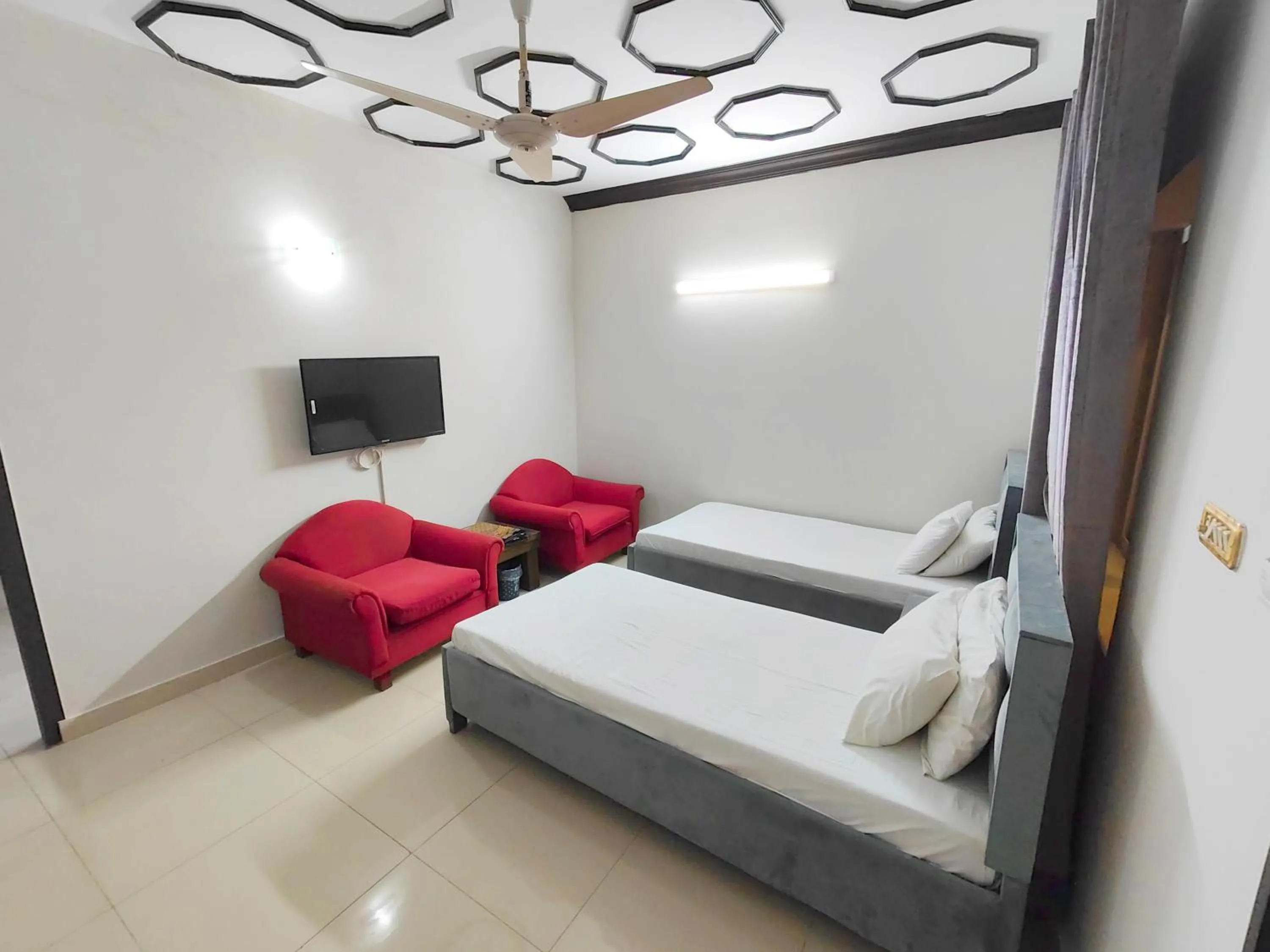 Bed in Aleph Islamabad Guest House