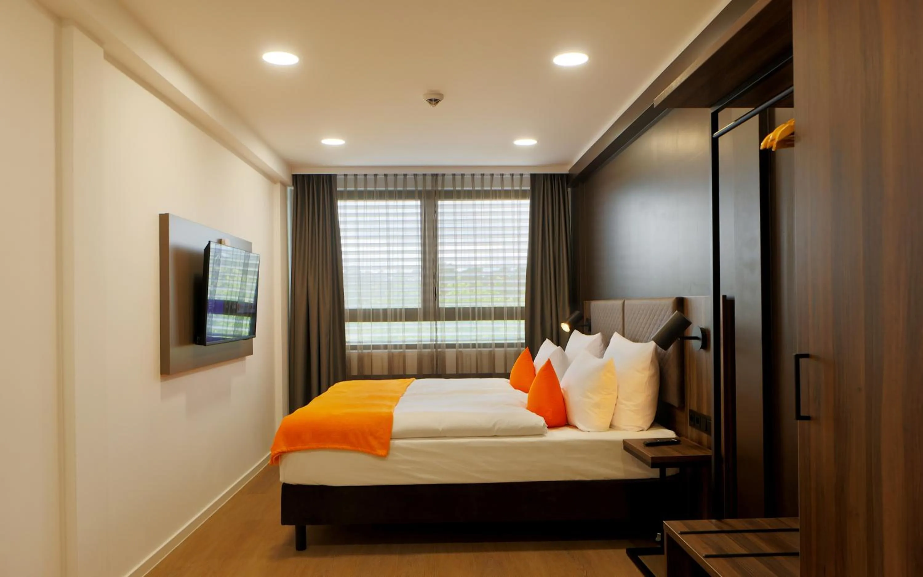 Bed in Trip Inn Hotel Frankfurt-Heusenstamm Tagungshotel